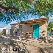 A darling bungalow on very large lot, zoned R-2 which means 2 houses could be allowed on this lot. In a quiet neighborhood. It was used as an Air bnb. It offers custom wall heater added 2015, Evap replaced in 2013, roof resealed in 2017, new windows 2009, pendant lighting and ceiling fans, 2009. Maple kitchen cabinets 2009, Saltillo tile and so very close to UofA, shopping conveniences. Parks as well as minutes to downtown. Whether you are looking for an investment or a home, it is one to come see.