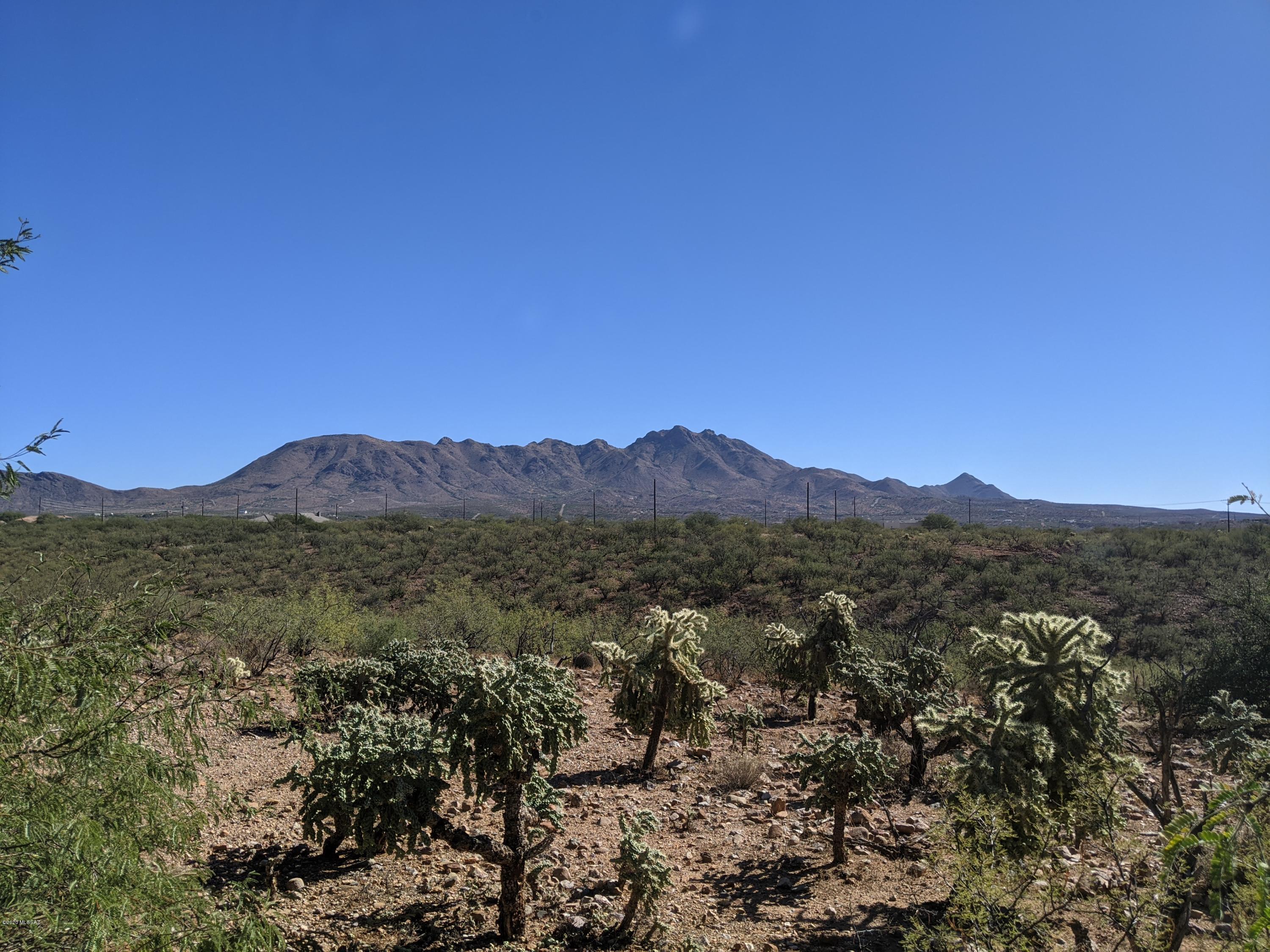Located about 5 miles from the Palo Parado Bridge exit on I-19.  All paved roads, electric at the street, water should be verified during the inspection period.  Great views!  Gentle downhill slope easy to build on.