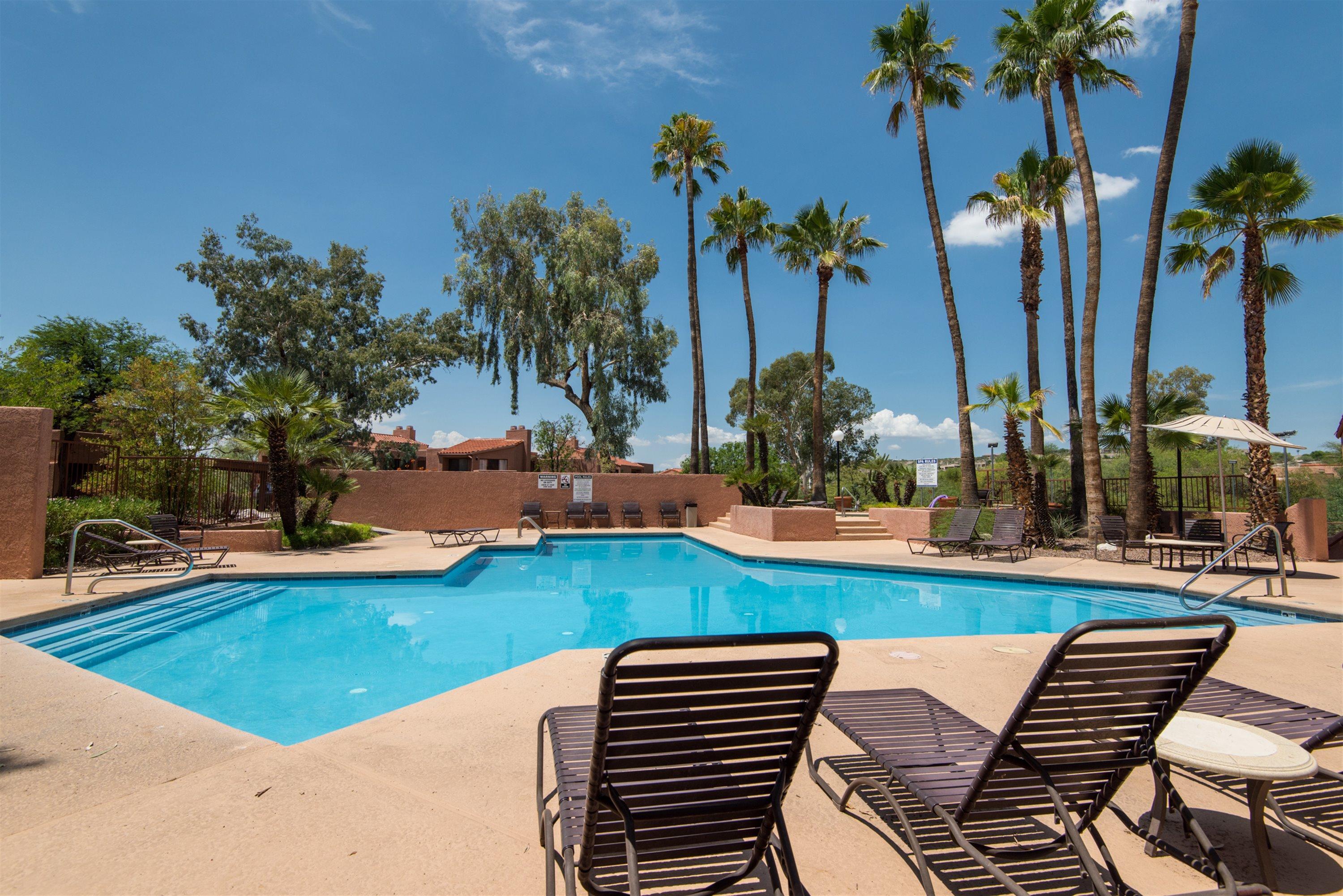 This charming 2BR/2BA ground floor Ventana Vista Condo features a split bedroom floor plan, ceramic tile flooring, private patio, open kitchen with mountain views and corian counters, a romantic wood burning fireplace, high ceilings, zoned heating & cooling and designer picked furniture throughout makes this Tucson condo the perfect vacation home. Resort style HOA amenities include heated pool & spa, tennis court, gated entryway, exercise facility and a spacious clubhouse with library, television and pool table. CALL FOR SEASONAL RATES AND AVAILABILITY!