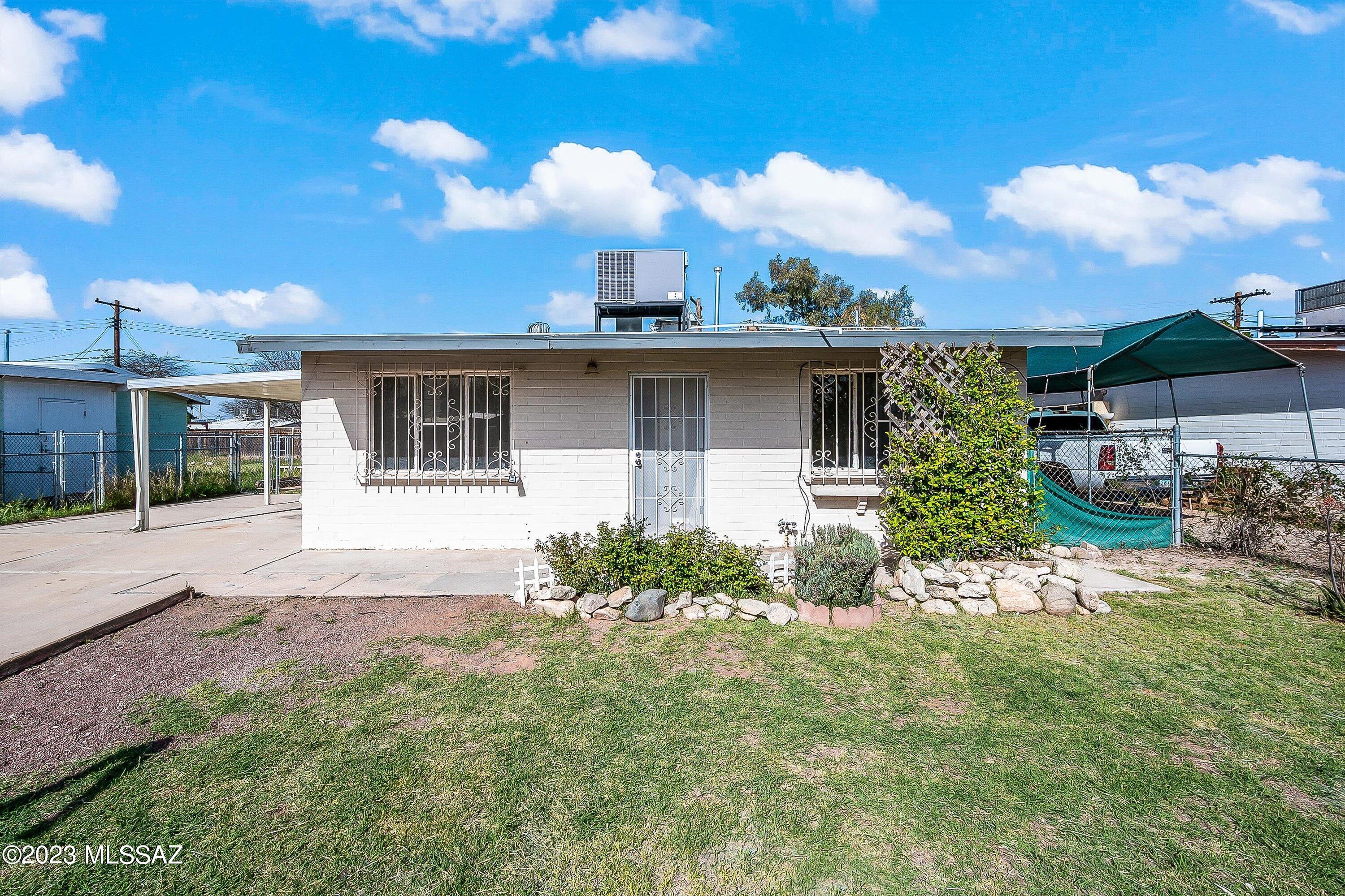 Welcome to this tastefully renovated two bedroom, one bath with a large backyard. This home would make a great first home or investment property. This home has an updated flat, rolled roof, new air conditioning with warranty, new appliances and updated fixtures. Great location close to schools, restaurants, and easy access to the freeway.