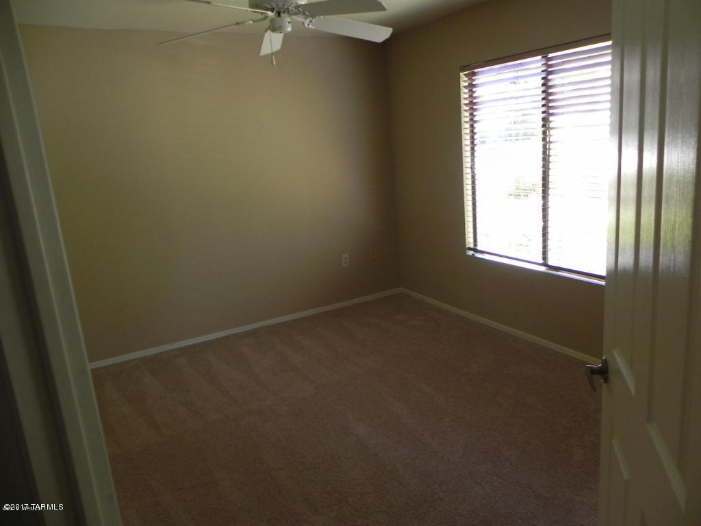 Enjoy resort style living near Ventana Canyon Resort and Sabino Canyon. This ground floor, two bedroom/two bathroom unit has a private patio, outside storage and walk-in closet. Interior boasts spacious living area. Gated community has heated pools, spas, fitness center and green belt