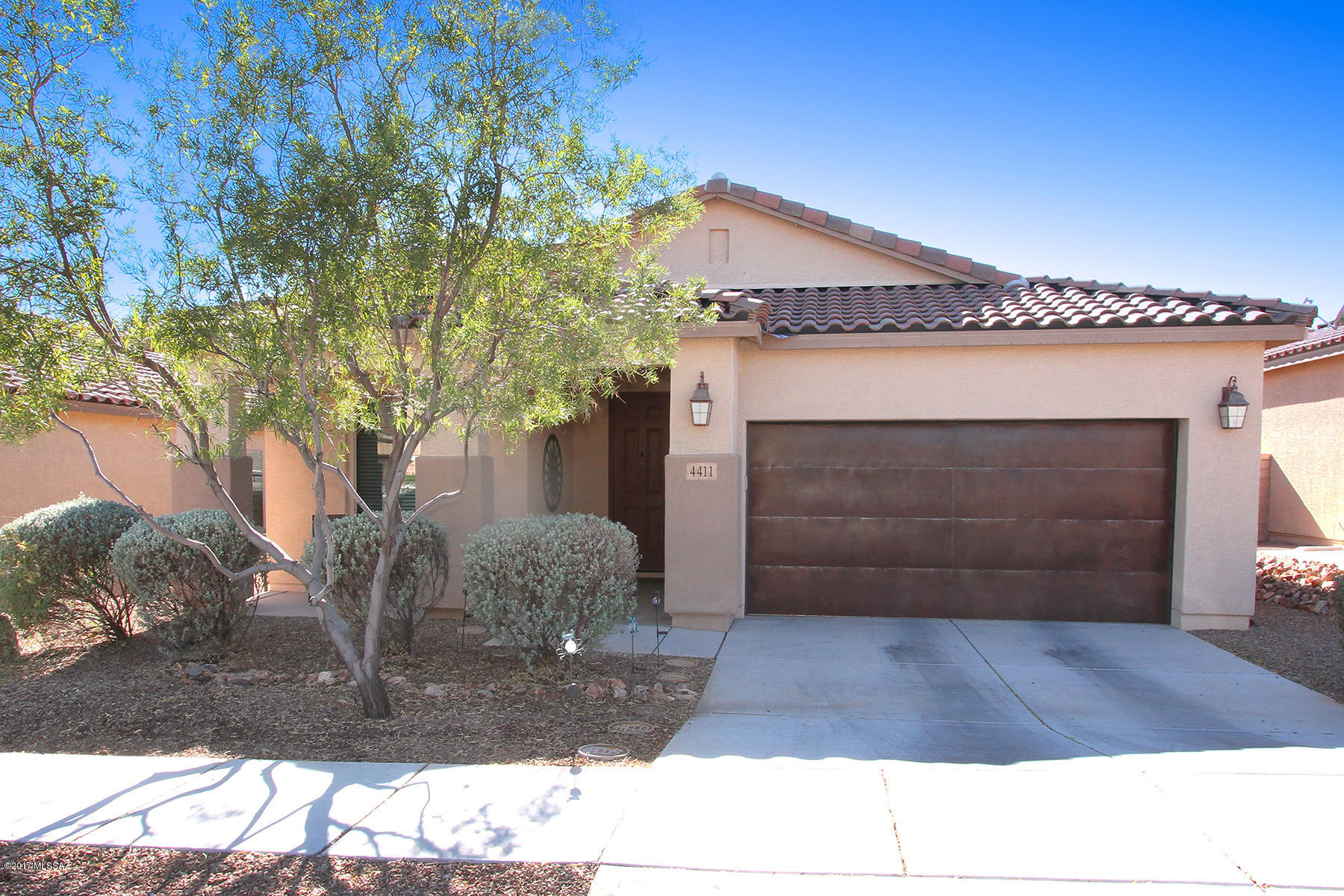 2011 Meritage quality built home that backs up to a common area and is located within a 500 acre preserve.   1652 Sq. Ft, Split Bedroom floor plan - 3 Bedrooms 2 Baths, spacious Living/Family room w/large picture windows, adjoining Dining area, eat-in Kitchen; pullouts, slab granite counter tops and Island Breakfast Bar .  Large Laundry Room. Garage w/4 foot extention.  Gas stub for BBQ, low maintenance front and rear yard. Covered Patio extended 4' that overlooks protected natural open space, offering mtn vistas and sunset views.  Near walking, biking trails, schools, restaurants and shopping.