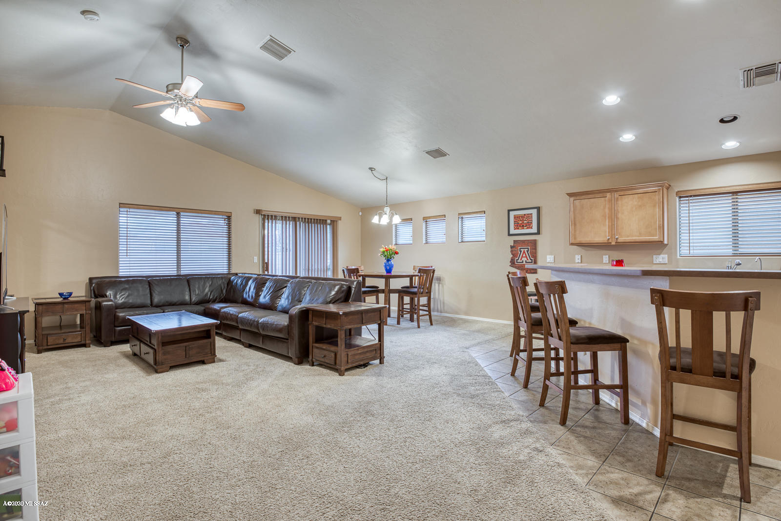 Three Bedroom 2 Bath home locate in a great Westside subdivision.  A 2004 Lennar home near the U of A and Pima West, shopping, schools and I-10.  Home includes a purchased electrical solar system which averages $30 a month electric bills!!
