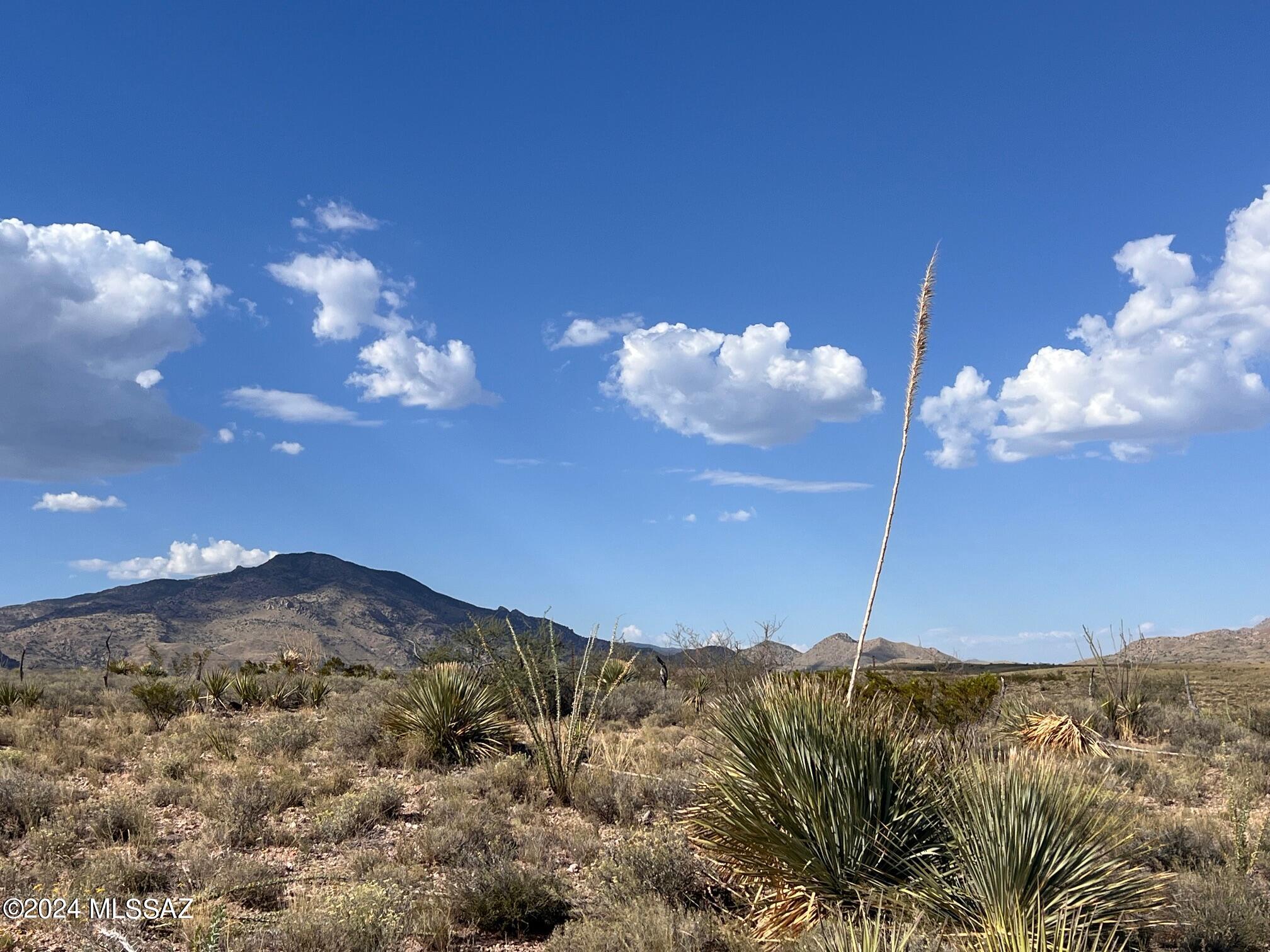 Two 10 acre parcels for a total of 20 acres that have  areas of hilltop that offer beautiful expansive views and sloping to flat ground for outbuildings and corrals. Good road access that is maintained by a Road Maintenance Association. Power pole nearby at eastern lot line. Close to State Land.