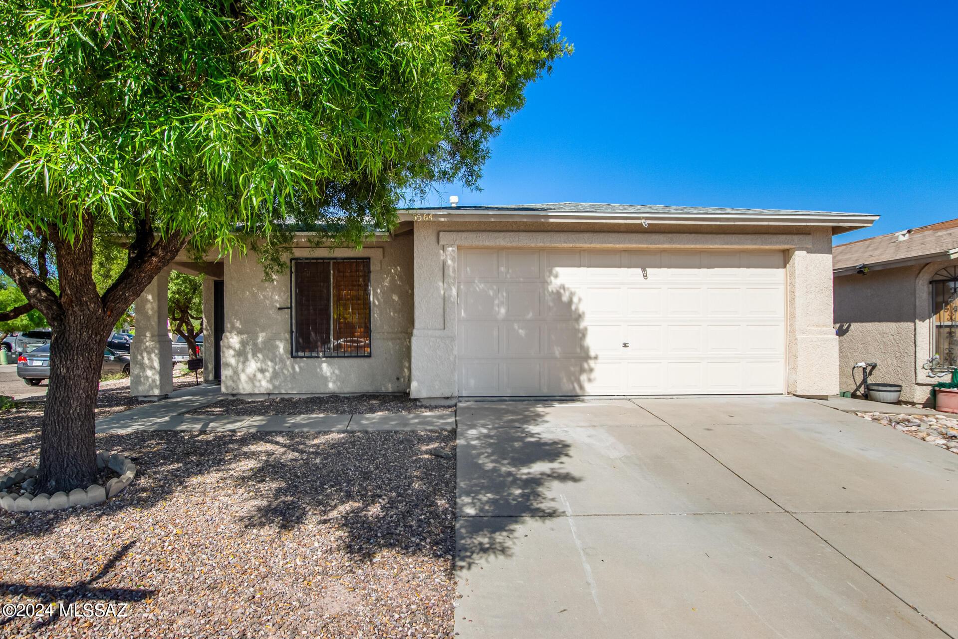 Your dream home awaits! This recently remodeled 4 bed, 2 bath beauty on a desirable corner lot is packed with upgrades. Step into a freshly painted interior with new lighting throughout. The kitchen shines with sleek new countertops, honey oak cabinets, and black stainless steel appliances. Both bathrooms have been thoughtfully updated, including a fully remodeled master bath. New carpet adds comfort in the bedrooms, while the finished and painted garage, complete with a newly painted floor, provides extra polish. Outside, enjoy the newly landscaped front and back yards and relax on the covered patio. This move-in ready home is a rare find!
