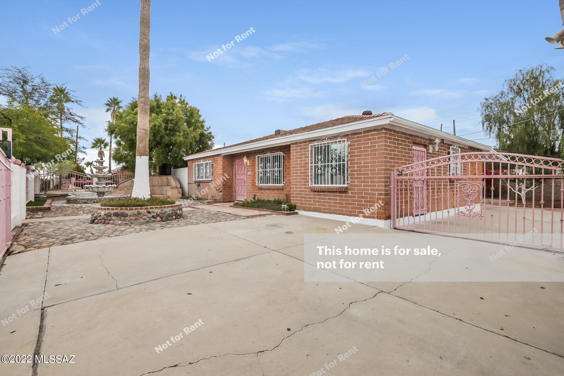 This Tucson one-story home offers granite countertops, and a two-car garage.