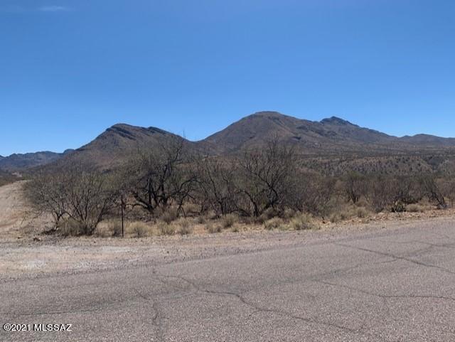 On blacktop. Nice and flat.  Corner Lot. Panoramic Mtn views!
Fire Station with Medivac helicopter right around the corner.
