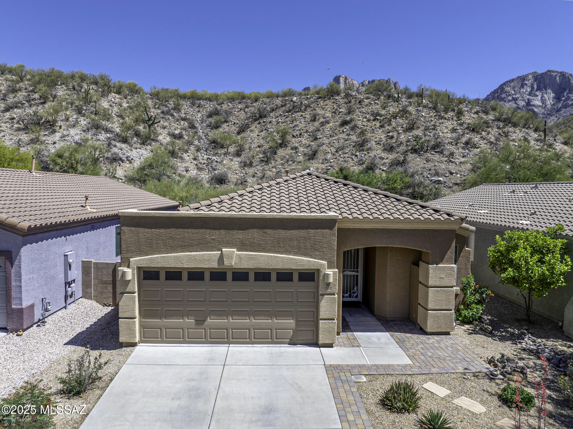 Discover this impeccably maintained, newer home nestled in the serene Ram's Pass neighborhood of Oro Valley. Located on a quiet street with no rear neighbors, you'll enjoy a private view of the natural desert foothills—your own private retreat right in your backyard. This spacious 3-bedroom + den, 2-bath home offers a desirable split-bedroom, great room floor plan—perfect for today's lifestyle. The spacious kitchen features newer stainless steel appliances, granite countertops, a honed travertine backsplash, and custom LED under and over cabinet lighting. Living flows seamlessly from kitchen to dining and living areas, ideal for entertaining or relaxing with family. The primary suite includes dual walk-in closets and a lovely ensuite bath with a custom travertine walk-in shower, ...(mo plus dual vanities and a private water closet. Enjoy Arizona's beautiful weather year-round with both front and back patio areas. The backyard is perfectly sized for low maintenance, featuring a flagstone patio, mature landscaping, and even a producing orange tree.

Across the street, the community park offers a shaded ramada, playground, basketball court, and a large grassy field with mature treescreating a great space for kids, pets, or simply relaxing outdoors.

Be sure to check out the full list of updates and upgrades in the attached documents. Don't miss your chance to own this gem in one of Oro Valley's most sought-after neighborhoods!