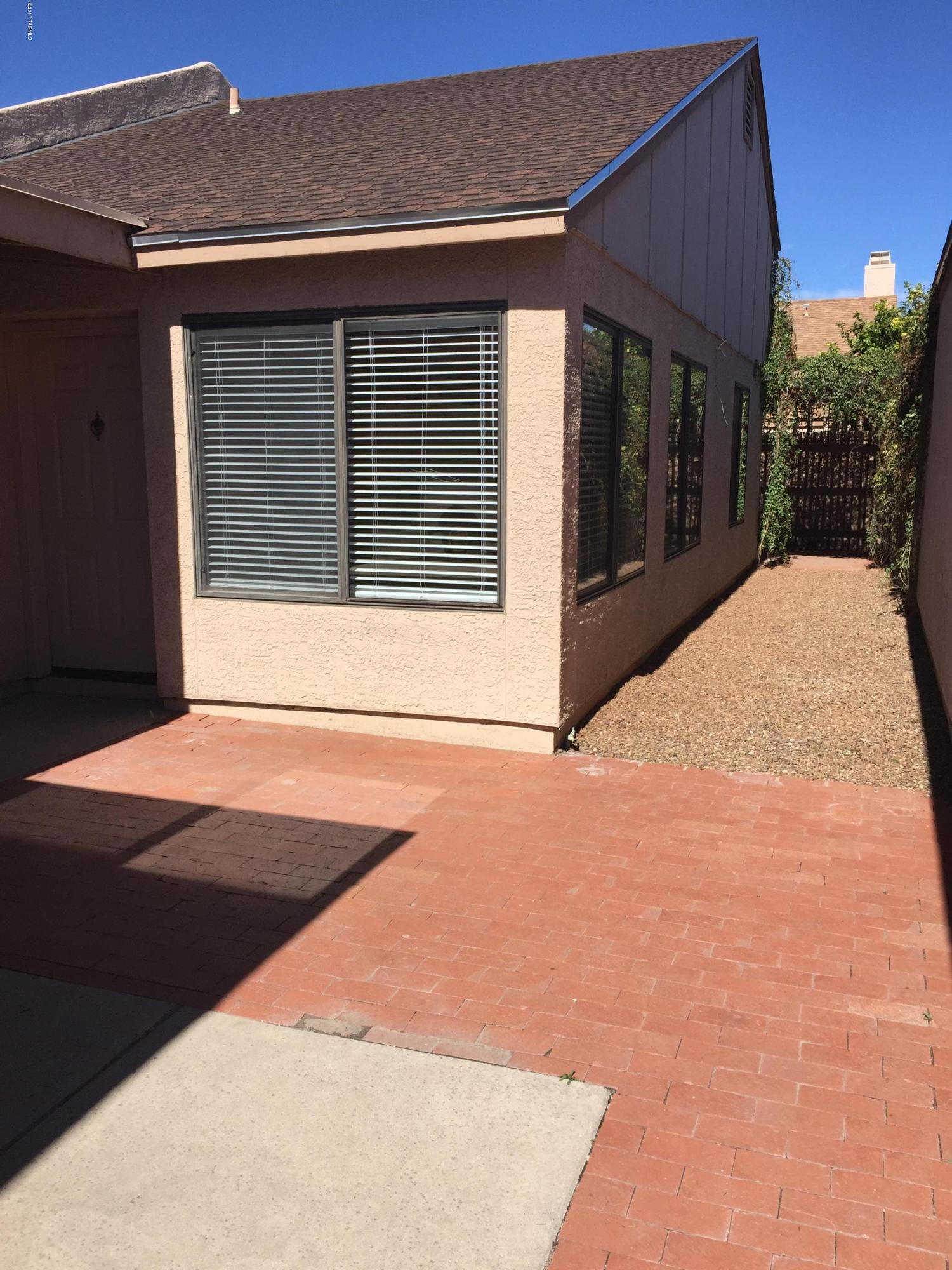Bright open townhome.Convenient to downtown. In the gated community of Casitas de Palo Santo. Saltillo tile, new carpet and paint.