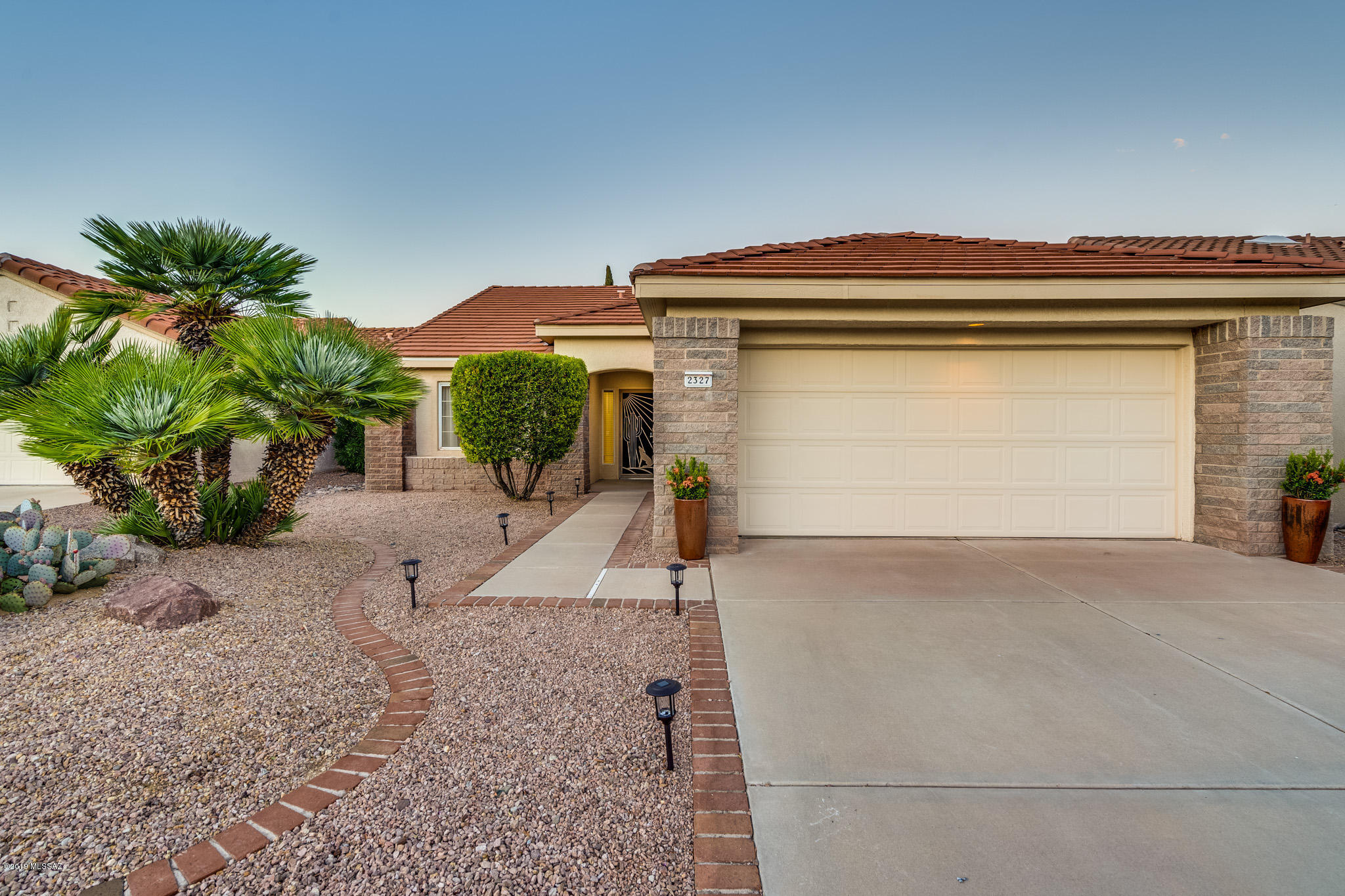 Owner/Agent DON'T miss out on this Amazing opportunity to own this Beautifully updated 2 bed, 2 bath home W/Den and open floor plan in the coveted Sun City Community. Too many upgrades to list but there  Brand new cabinets throughout with soft close drawers & doors & white quartz countertops. New SS appliances W/Fridge. Master bed/bath has a walk-in master shower with tile surround, brushed nickel fixtures, double vanities, tile flooring, new toilet, new carpet, & closet system. Guest bathroom has tile surround, new toilet, brushed nickel fixtures. New LED lighting throughout including recessed can lights, ceiling fans & pendant lighting. New 40 gallon water heater.  Community amenities include golf,  workout facility, 2 pools, restaurant, tennis, woodshop, pottery & jewelry shop & MORE!