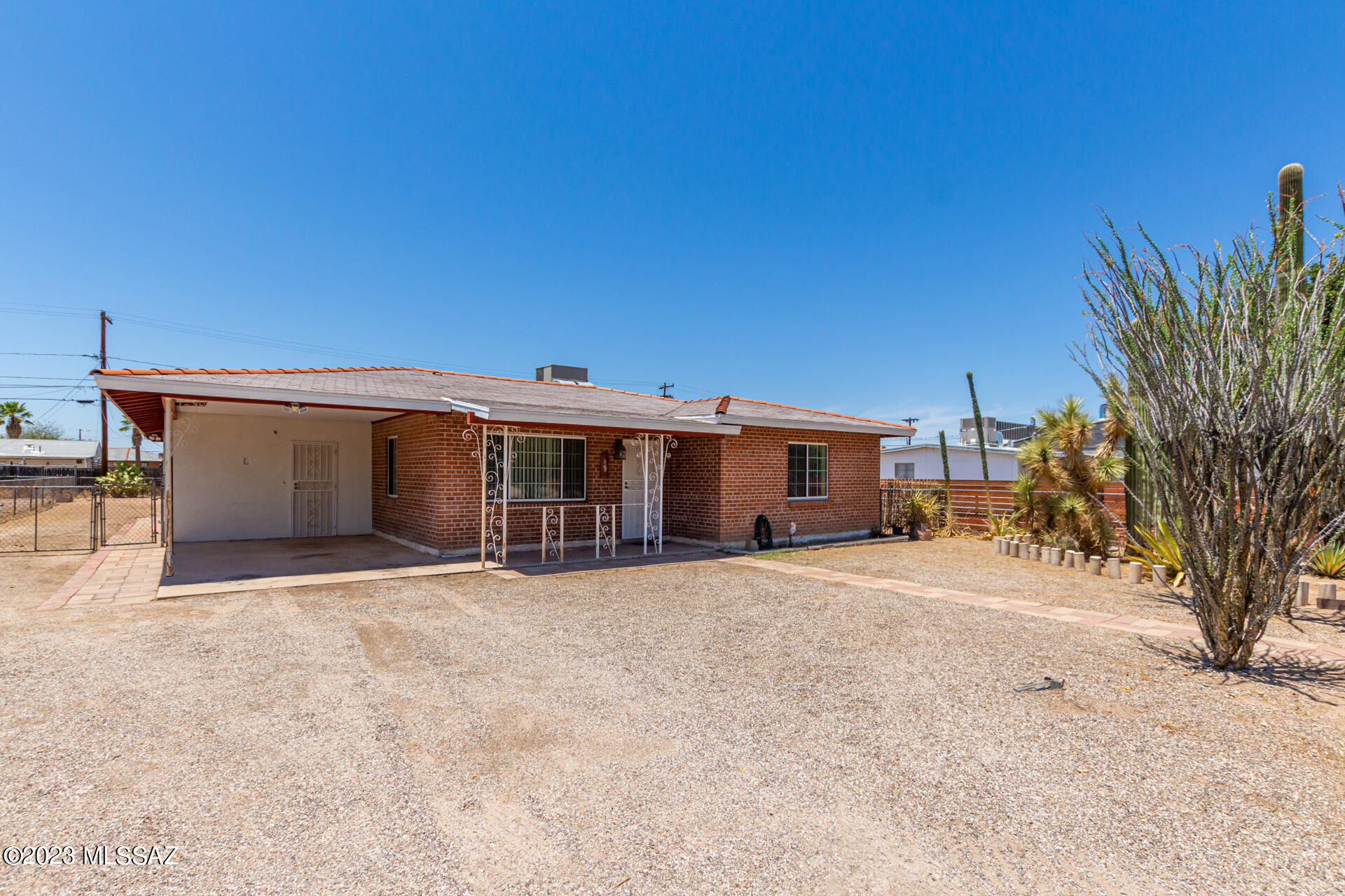 Welcome to this 3 bed 2 bath + Den home, on a huge lot! Upon entry, discover an inviting living/dining room, tile flooring,  and open floor plan. The spacious kitchen features ample counter space and cabinets with a breakfast bar that is great for casual dining. You'll love to get creative with the large bonus room/den; make it a hobby space or an additional bedroom! The generosity of space continues outdoors in the backyard, providing a covered patio, a desert landscape, a fruit tree, a storage shed, and an oversized backyard with a ton of potential. Take advantage of the potential of this property! Home is sold as-is.