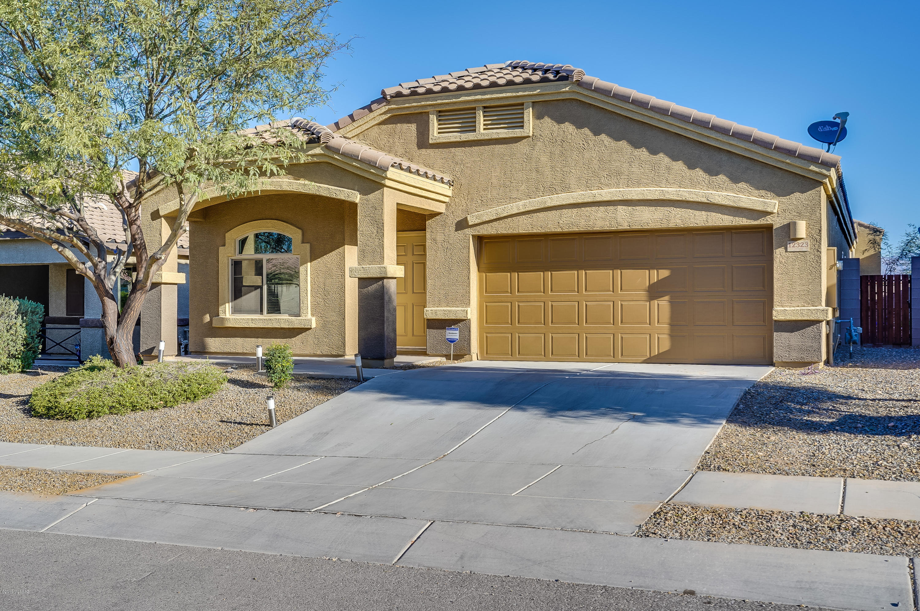 Beautifully maintained 3BR+Den (potential 4th BR- see attached floorplan) home in Vail School District w/ many upgrades including a completely done large backyard featuring a covered patio, turf grass, fire pit & a newer Pebble Radiance Pool w/ a solar blanket & a screen logic system (controlling speed of jets, light & cleaning system). Original owners. This energy efficient, very open DR Horton floorplan is very hard to come by and it showcases 9' ceilings, ceiling fans throughout, upgraded maple cabinets & upgraded flooring. Gas stove & lots of cabinets in spacious kitchen w/ very large kitchen breakfast bar. All appliances are included! Why deal w/ new construction and/or putting in new pool when you can have a great home w/ backyard mountain views- that is ready & just waiting for you!