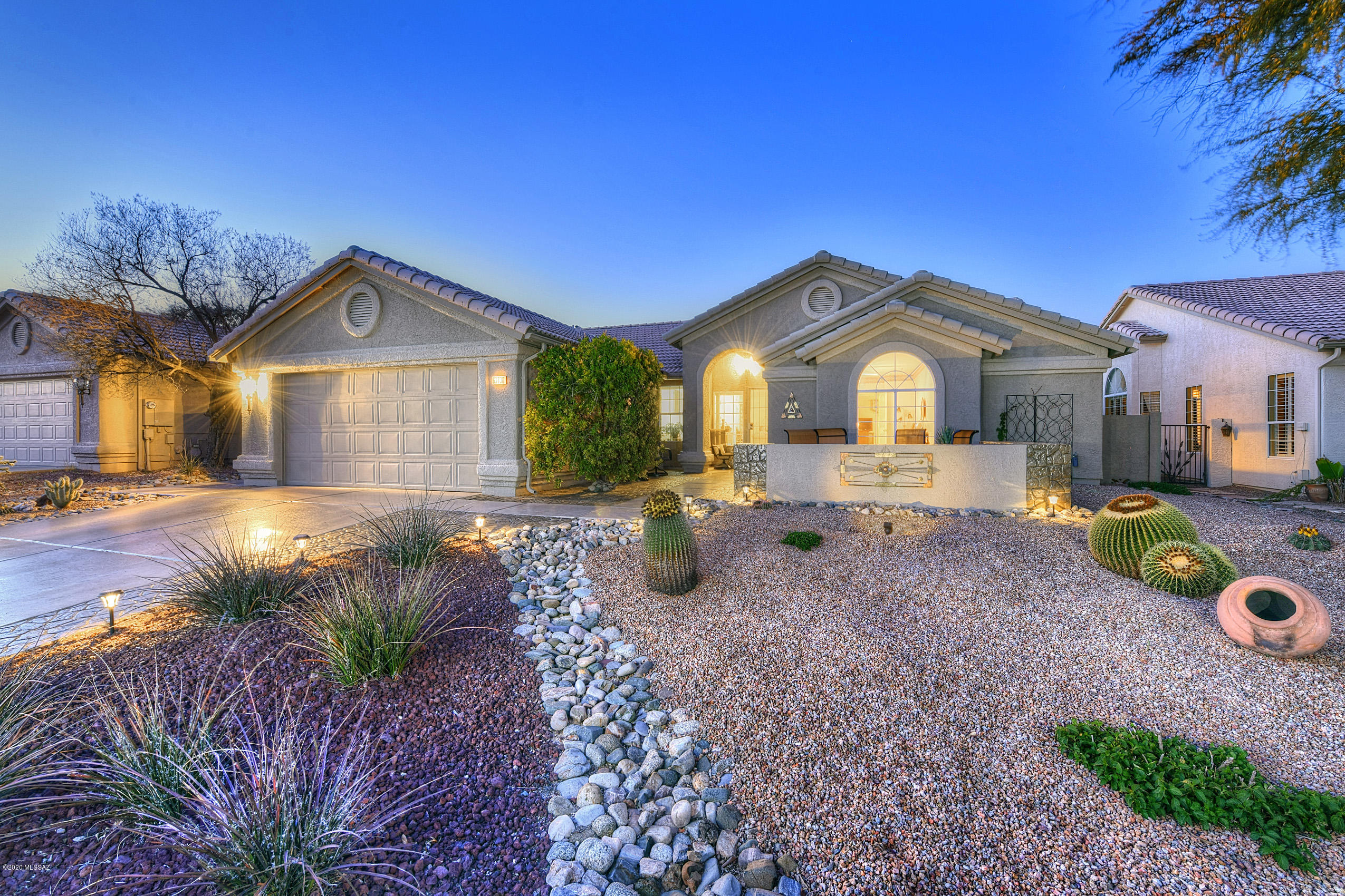 Peaceful, Comfortable, Spacious and Charming just starts to describe this wonderful Topaz Model home nestled on a 14,810 Sq Ft expansive, peaceful Saddlebrooke Lot. Our backyard is adorned with a tranquil fountain, multiple patios, citrus and fruit trees, & a charming wall with a inviting archway. There is ample room to add a beautiful outdoor pool. With a north/south exposure that brings lots of light to the interior of the home, we are blessed with backyard shade for our entertaining pleasure. Front patio with mountain views.  Enjoy entertaining & cooking from our wonderful kitchen which includes cabinet microwave , electric ovens, stainless steel appliances and wonderful gas cooktop. HVAC installed 2018-2019, custom remodeled master bath and professional updated 3 zone irrigation system of home is newly painted and driveway is epoxy coated. Home is located near Saddlebrooke 1 clubhouse for golf, pool, tennis, fitness center and dining.