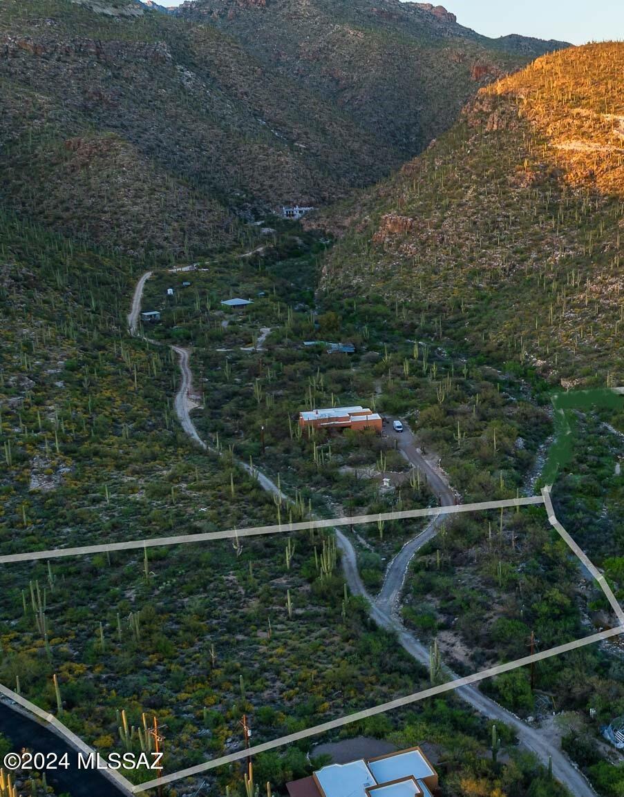 Nestled in the sought-after Tanque Verde Valley, this stunning 3.31-acre parcel offers a rare opportunity to build your private oasis. From the moment you step onto the land, you'll be swept away by panoramic views of Molino Canyon and Agua Caliente Canyon, nature's masterpieces that will steal your heart & calm your soul.  The Northern section provides an ideal building site, perfectly positioned to capture the dramatic desert landscape. With utilities conveniently close by, the land is ready to bring your vision to life.  A nature enthusiast dream with nearby hiking trails or take a short drive to Mt. Lemmon for a day of adventure. With this tranquil setting, you'll enjoy the best of rural living with all the convenience of being close to town. Call for an appointment
