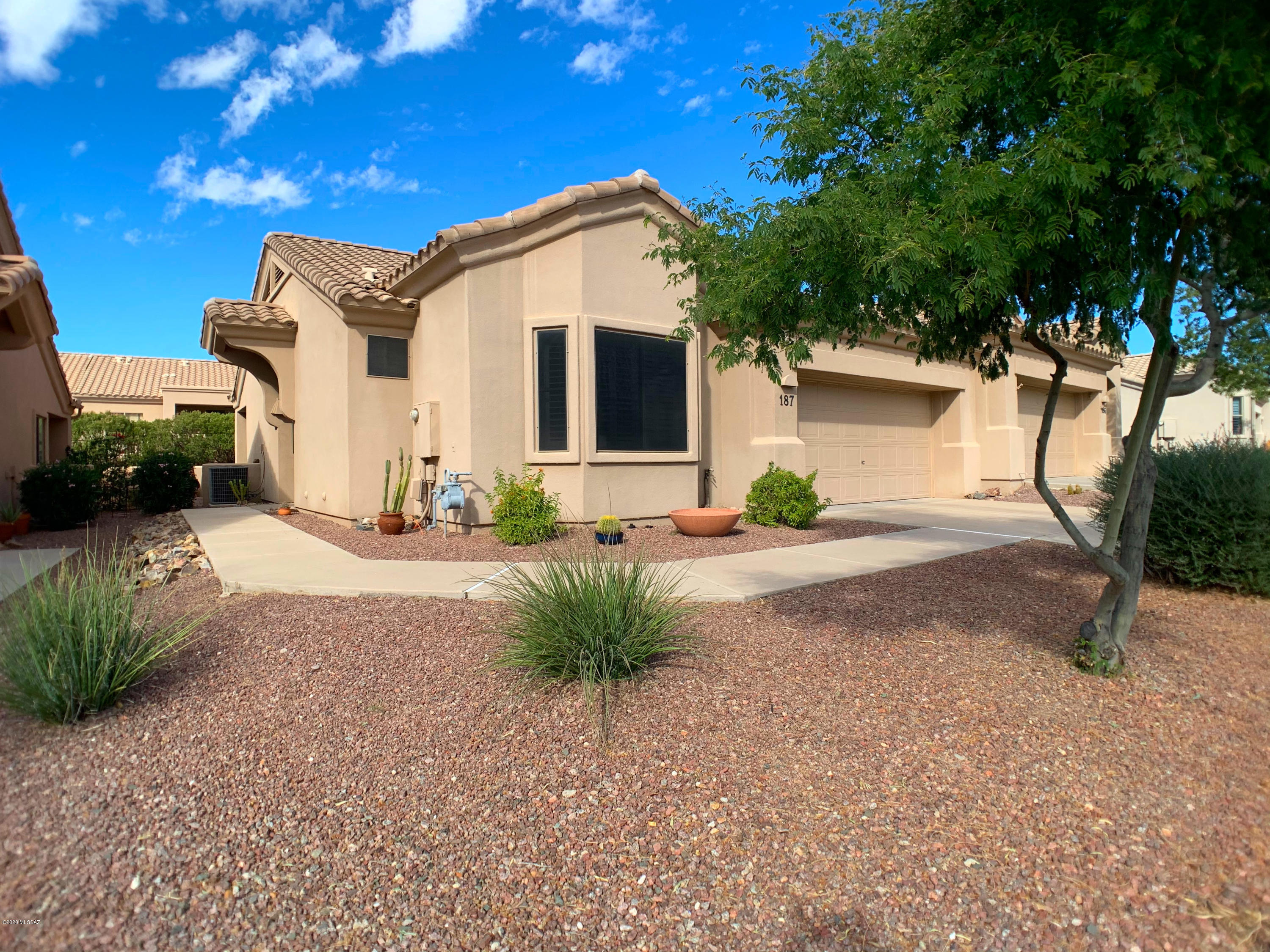 This gorgeous 2/2, 1282 sqft patio home in Oro Valley has been meticulously updated & is move-in ready. Truly a must-see! Located within the age-restricted & gated Vistoso Village community. Spacious & Open w/ vaulted ceilings. Split bedroom plan offers 2 master suites w/ walk-in closets & baths. All new SS appliances, granite countertops throughout, eye-catching finishes, newly tiled showers, updated hardware, fixtures, flooring, new shutters on every window, freshly painted interior & so much more. Backyard can be completely enclosed by adding a gate. HOA fee includes water, garbage, sewer, cable tv, front & back landscaping, pest control, roof, structure ins, ext paint, clubhouse & gate. HOA amenities galore, plus many clubs & fun activities year-round. Turn-key option available.