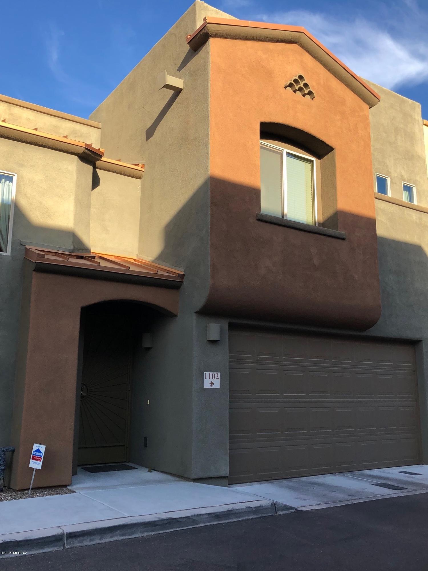 Built in 2014 home, which you will not see many in this price point in the area, is a bike ride away from the UofA! Very convenient if you work at the University, close to the freeway/parkway if you are to drive to Banner, airport, downtown and Sun Corridor facilities. Walking distance to a bus line. If you are an investor- seller has quotes from the property management company for up to $2000/mo rent. Gated community, easy care home is ready to move in!  Large kitchen with granite counter tops and plenty of cabinet space, 18 inch tile downstairs, spacious bedrooms and much more! HOA covers roof maintenance, exterior paint, hazard insurance, gate and termite care! What a great combination of quality and convenience! Call for an easy appointment - this one will not disappoint.