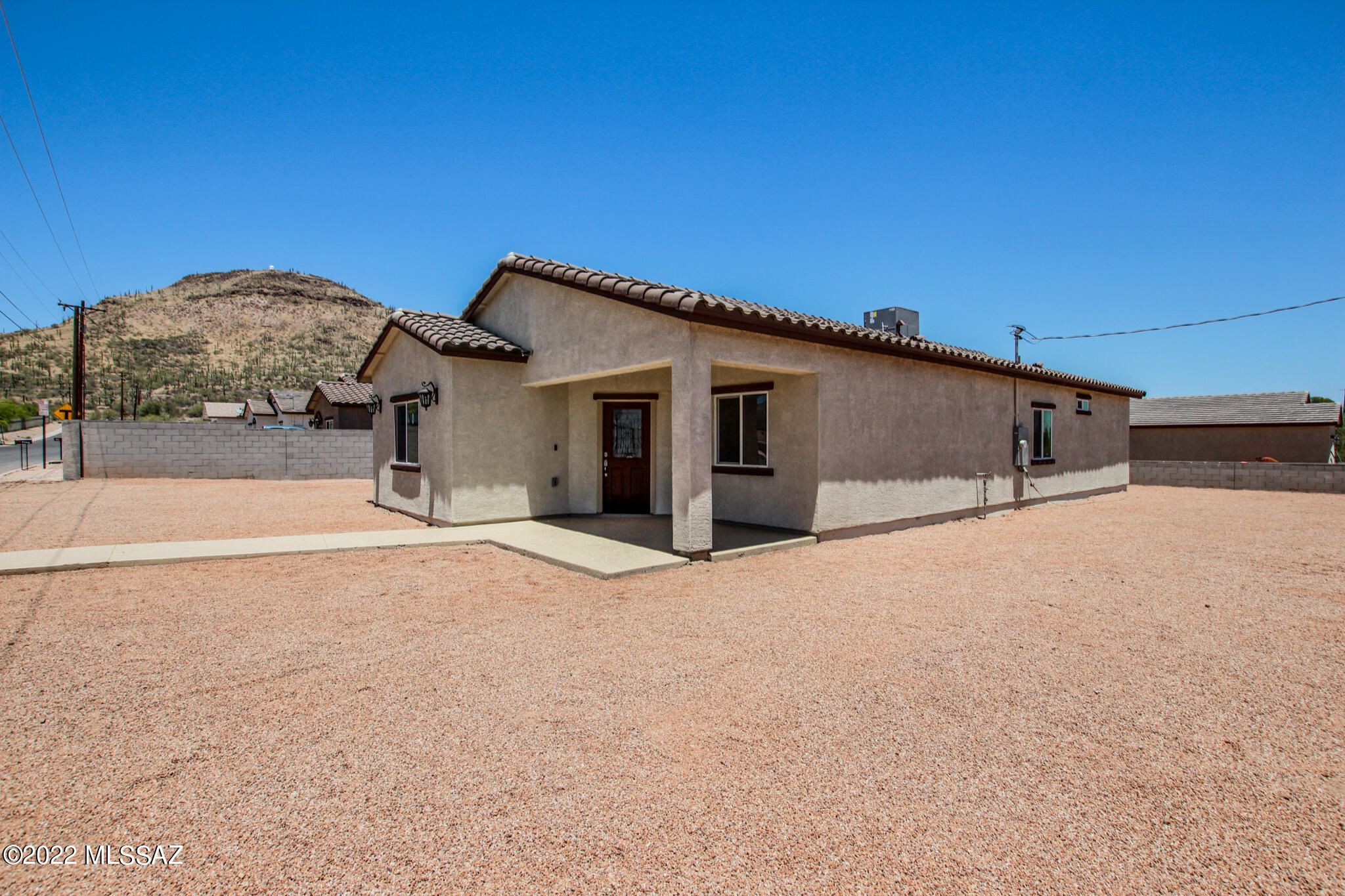 NEW CONSTRUCTION - FINISHED ON 5/30/2022! Beautiful 4 bed 2 bath, 1670 Sq Ft home, located in desirable West Tucson. Home features light grey porcelain tile, granite countertops, 5' kitchen island, beautiful soft-close cabinets, walk-in pantry, walk-in closet in master bedroom and walk-in showers in both bathrooms. Backyard has a covered patio where the views and fireworks A Mountain has to offer can be enjoyed. Located just minutes from I-10, Starr Pass Resort, Tumamoc Hill, Mercado San Agustin, downtown Tucson and so much more!