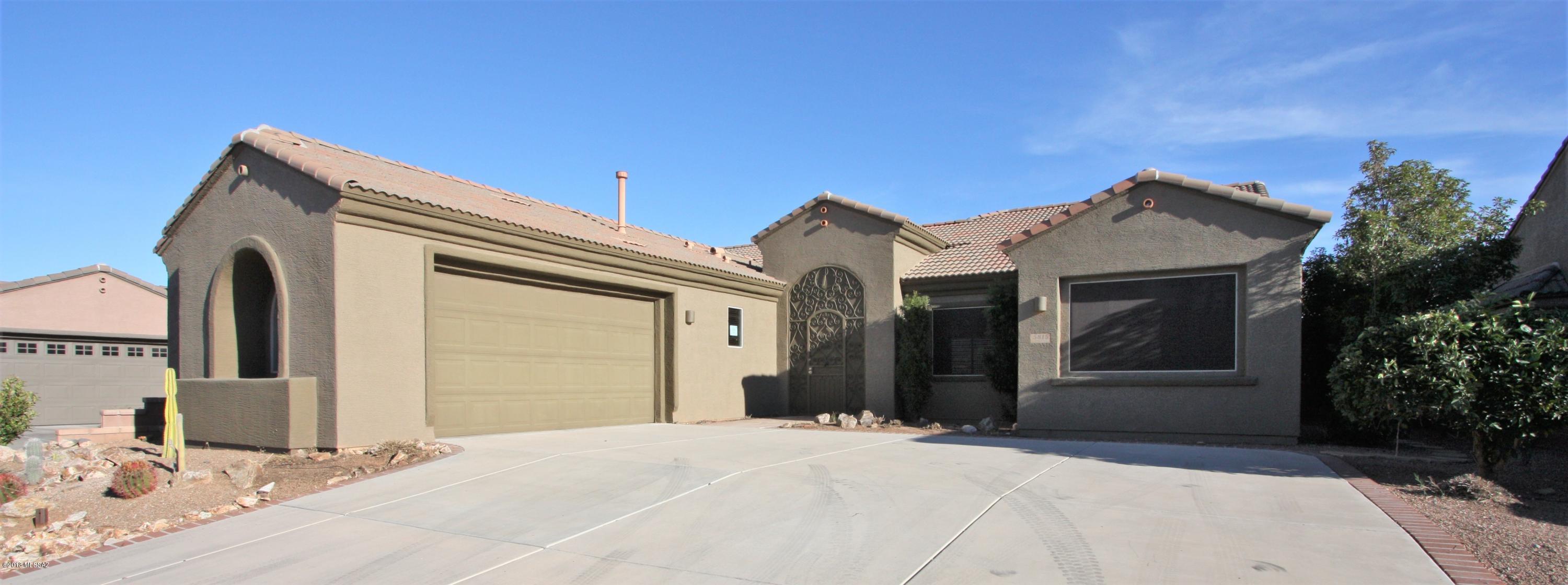 Magnificent 3 bedroom + den, 3 bath home located in the gated Active-Adult community of Canoa Ranch. Open, bright, and spacious floorplan with tons of open space. The interior features a generous kitchen with granite countertops, a double oven, gas range, an island, pendant lighting, & tons of cabinets; formal dining room; ceiling fans; split bedroom floorplan; as well as a garden tub, walk-in shower, & huge walk-in closet in the master suite. Attractive backyard with brick pavers, built in bbq, water feature with a waterfall, custom iron security doors, mountain views, & expansive covered patio perfect for enjoying the sunset or for entertaining! Walking distance to club house. Agent Owned.