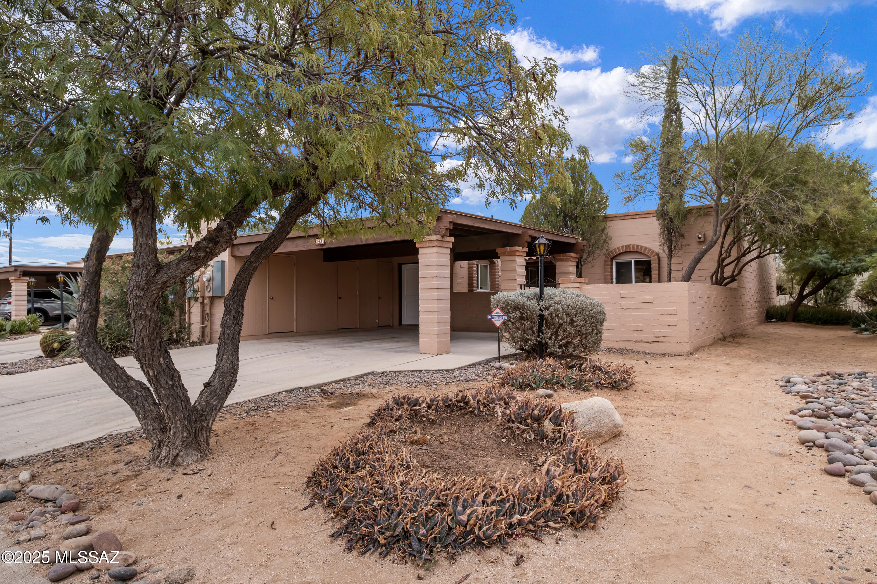 Don't miss out on this beautiful newly remodeled 2-bedroom, 2-full bath townhome in a highly desirable neighborhood.  New HVAC, New Roof, New Hot Water Heater, New remodeled kitchen with white soft close cabinets, stainless steel appliances, granite countertops, gooseneck faucet with an in-sink metal basket liner and a garbage disposal.  Enjoy your New light colored French faux wood durable floors throughout the home.  Two newly remodeled bathrooms, one with a tub and one with a walk-in shower. Both bathrooms feature a mirror with built-in lights and defogging options, as well as a small skylight for natural lighting.  Want to enjoy some fresh air, just step into your high-walled backyard and enjoy your landscape from the comforts of your covered patio.  See Supplement- As a bonus, put your personal touch on your future home where you can select the ground covering: 3 selections of rock colors and/or faux turf.  The gated front entry way will use the same rock color you choose for the backyard.  Don't let this opportunity pass you by, schedule your showing today!