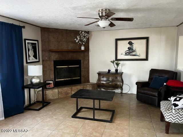 Great investment opportunity for cash buyer.  You can add your personal touches an improvements.  The property is situated on an oversized lot with no HOA.  There is plenty of  room for your RV or work trailer.  The kitchen has plenty of white cabinets and a separate dining area. Your family will enjoy the charming fireplace located in the living room. Flooring is tile and laminate.  Recently installed Evaporative cooler,freshly painted interior and new toilets. Ideal location for easy and quick access to the I 10. Home is being Sold AS IS.