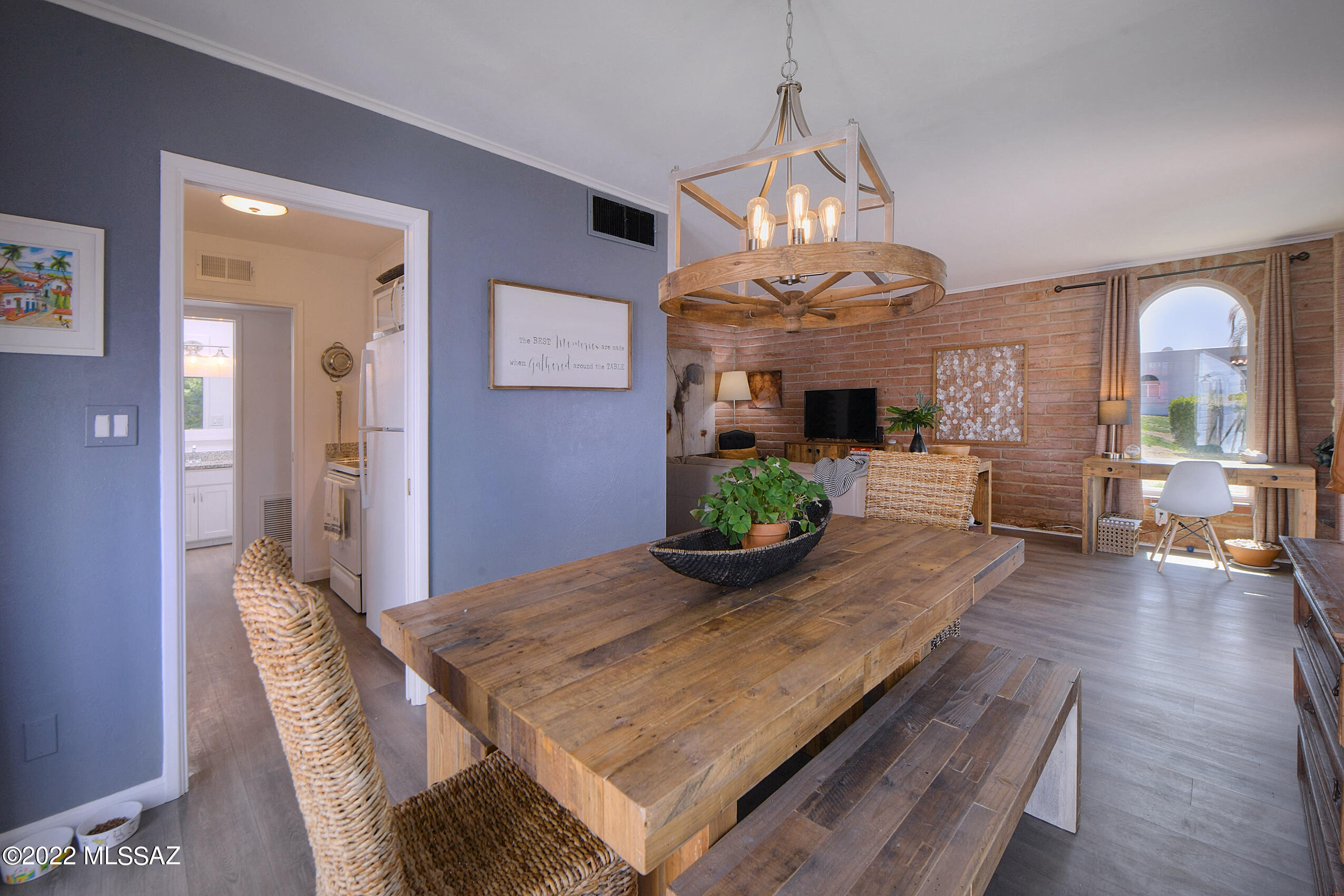 OPEN FRI 2-4! ADORABLE & FULLY FURNISHED 1 BR/ 1 BA   BURNT ADOBE CONDO IN DESIRABLE CASITAS DE CASTILIAN, AN OVER 55 COMMUNITY SITTING ON 17 LUSH ACRES OF COMMON AREA DESIGNED BY RENOWNED ARCHITECT BENNIE GONZALES. HM BOASTS PERFECT LOCATION IN CENTER OF COMMUNITY ON KNOLL OVERLOOKING LAP POOL, A LIGHT & BRIGHT FLRPLAN W/ CHARMING ARCHED WINDOWS, WOOD LAMINATE FLOORS THROUGHOUT (NO CARPET), DESIGNER PAINT, BRAND NEW HEATING/ COOLING, COMPLETELY REMODELED KITCHEN W/ GRANITE COUNTERS, UPDATED BATH W/ SUBWAY TILES & 2 PRIVATE, BRICK PATIOS. HOA COVERS WATER, SEWER, GARBAGE COLLECTION, BLANKET INSURANCE POLICY, MAINTENANCE OF GROUNDS, PAINTING OF BUILDINGS, 2 HEATED POOLS, TENNIS & CLUBHOUSE. CASITAS HAS BEEN DESIGNATED HISTORICAL SO PROPERTY TAXES WILL DROP OVER 40% FOR OWNER OCCUPIED UNITS!