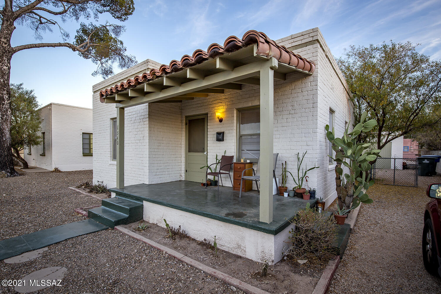 They had such great style in 1936! This charmer sits on a pretty large lot. R2 zoned and ready to expand, if thats what you want to do. It has been well maintained, freshly painted and has a really great detached garage. As we see the student housing market change these university neighborhoods are seeing more families move back in. That being said, if you are looking for an easy to rent investment property no problem keeping this one occupied. If you lived here, you could stroll out your front door and be at a number of restaurants, galleries, sporting events ect in a matter of minutes! This is a great home in the heart of our awesome city, this is your chance to lay stakes in the center of Tucson!
