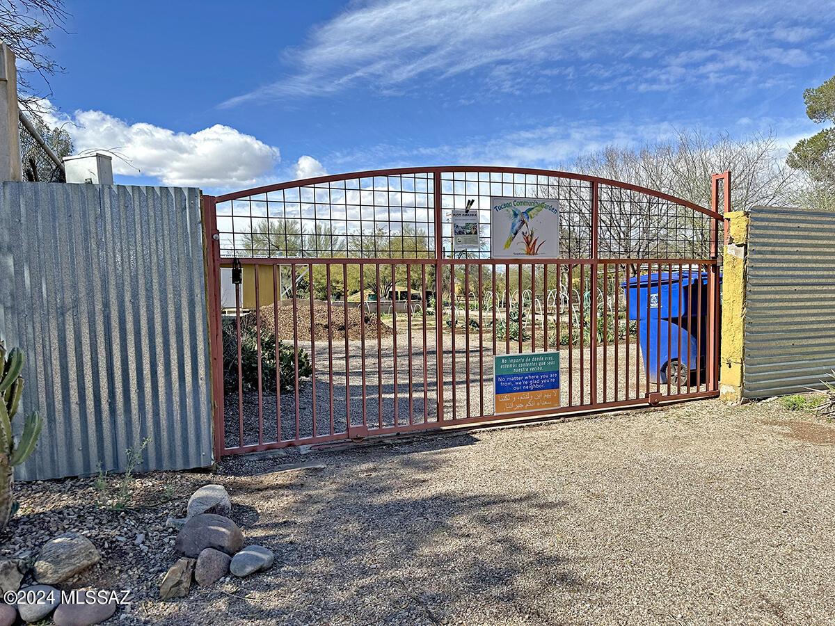 Currently used as a beautiful community garden. 
Lot is gated.