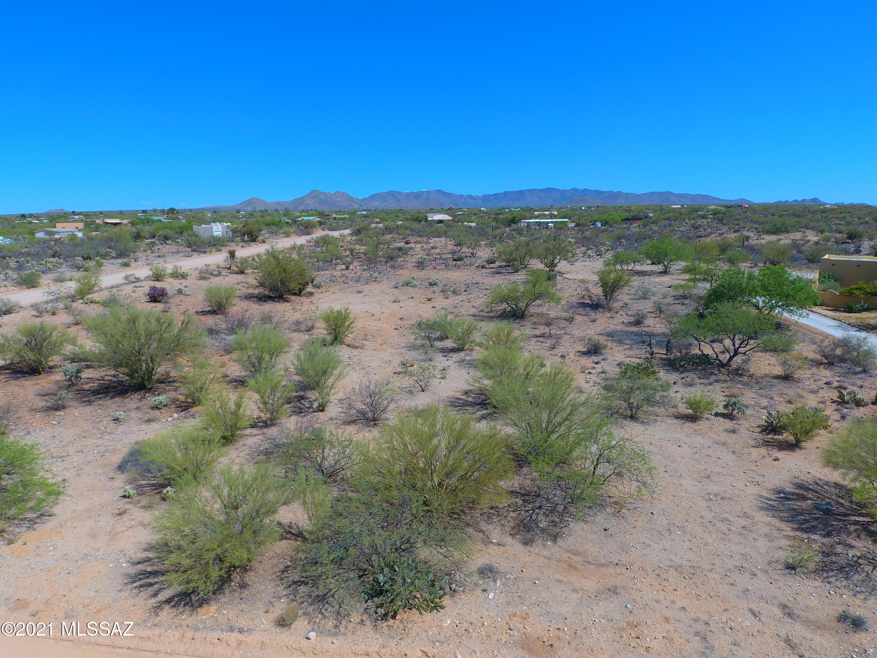 Welcome to Diamond Bell Ranch. Our little, well kept secret. Enjoy all that Southern Arizona has to offer, with star-lit nights and the mountain views of Kitt Peak. Build your dream home on this corner lot. Call listing agent for details on a local builder, that has bulit multiple homes in the area. All this, with no HOA.