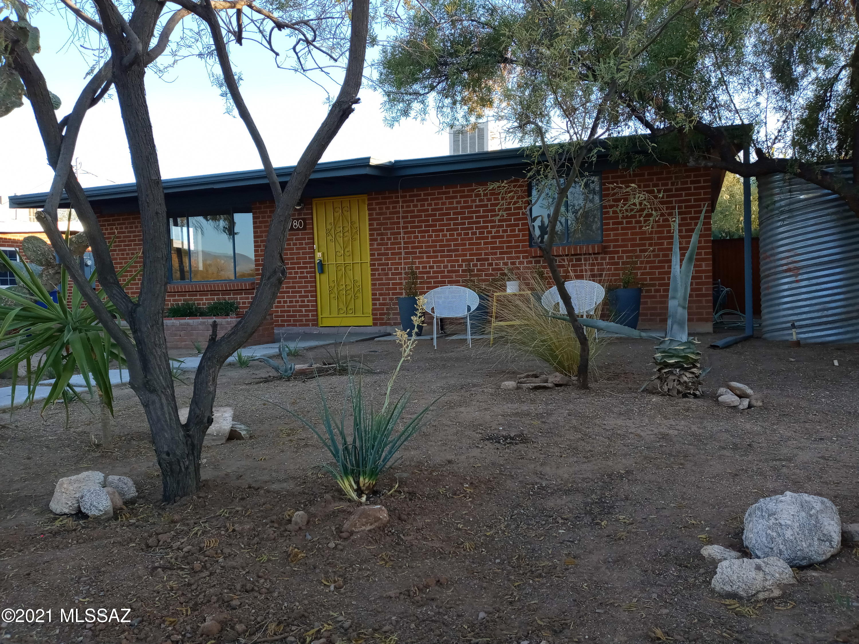 Charming, clean, upgraded 2BR/1Bath with an enormous family room, and a huge yard (9148 sq.ft. Lot). Solid Brick construction, large carport, covered patio in back, 200 AMP electric service, mature vegetation, and a great neighborhood in a convenient central location make this a great buy! Totally upgraded in 2018: 3 years left on Roof Warranty; Sewer line replaced; interior waterlines improved;