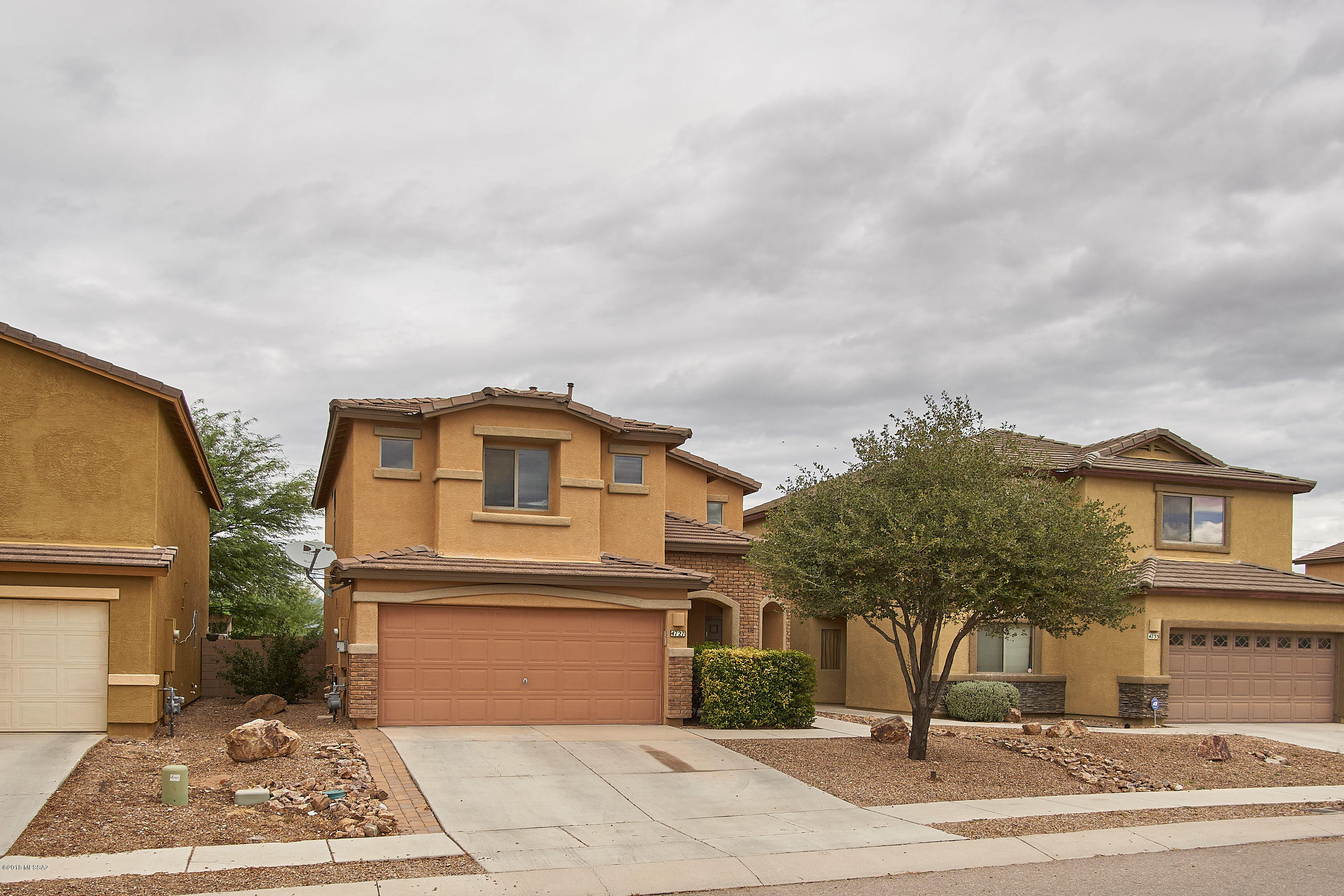 Gorgeous 3 bedroom 3 bath home well cared for home in Valstate. Kitchen features beautiful concrete look, upgraded cabinets, and stainless steel appliances. Upstairs has spacious 3 bedrooms, and a loft. Walk out balcony off of the master bedroom, so you can enjoy the views of Tucson's sunsets and mountains. This home will not last long, schedule a showing today!