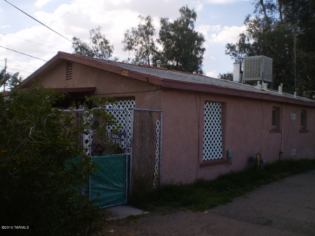 Perfect for major rehab.  Front house needs work, previously rented for $790. Both mobile homes need work, previously rented for $450 each.  Permited but unfinished casita could be rented for $500 plus.  This could be a major money maker.
