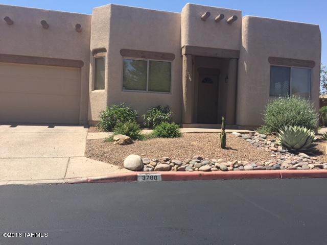 Wonderful home on corner lot in modern community. Home has range, refrigerator, dishwasher, disposal, washer and dryer, breakfast bar, eat in kitchen, dining area, fireplace i living room. There are Polished concrete floors in living areas and carpeted bedrooms.3 bdrm or 2 bdrm + office, one bedroom has wall bed, nice covered patio, block fenced yard with shade trees and community pool. Close to U of A, UMC shopping and restaurants.