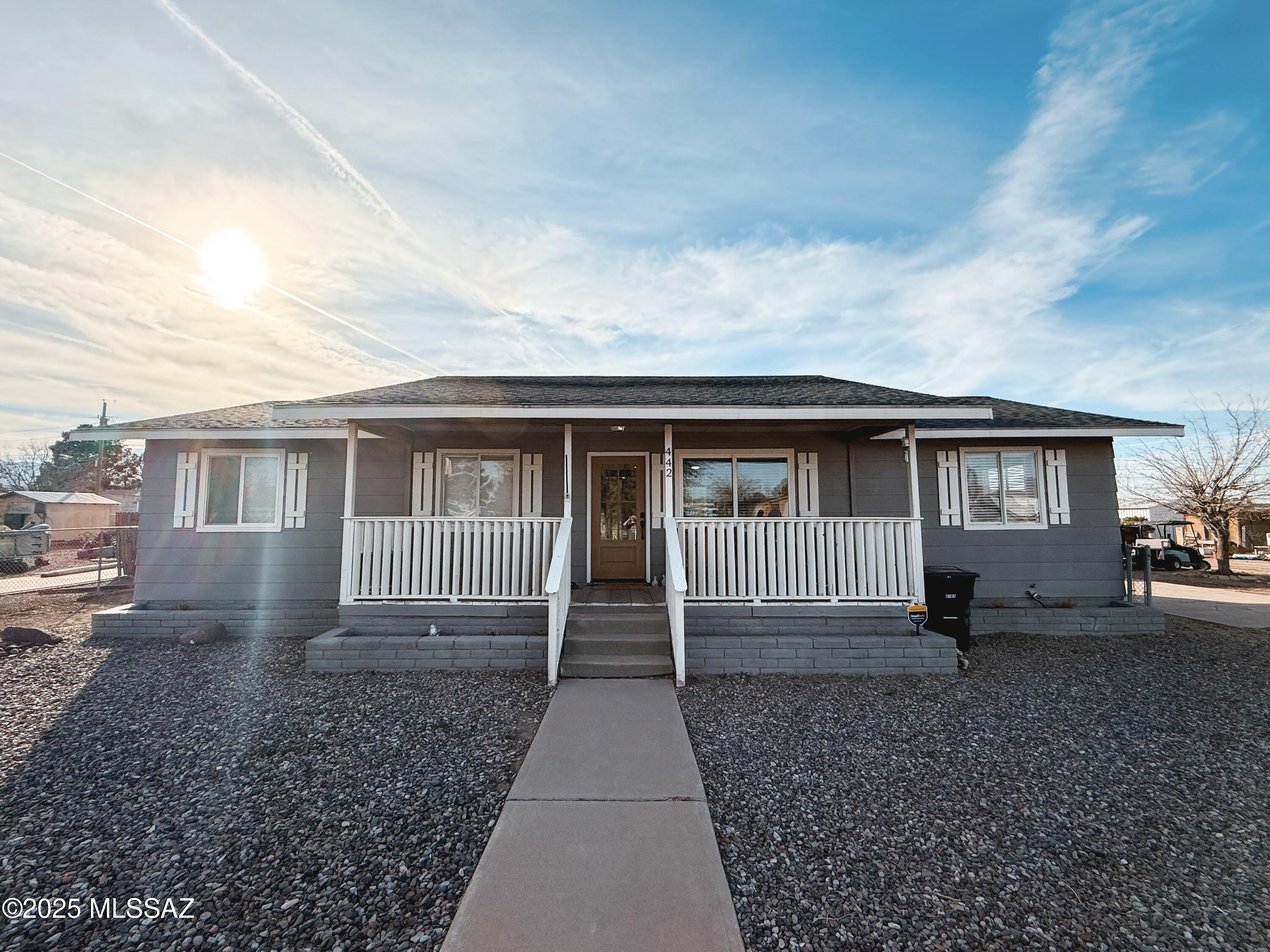 Welcome home to this wonderful 4-bedroom, 2-bathroom retreat, offering 1,528 square feet of comfortable living space in a prime location close to town and all amenities.Step inside and enjoy the beautiful natural light that fills every corner, creating a warm and inviting atmosphere. The layout is perfect for families, with spacious bedrooms and an easy flow throughout the home Outside, you'll love the backyard deck, the perfect spot to unwind in the evening while taking in the breathtaking mountain views. The front porch offers a welcoming space to sit, relax, and greet your neighbors, adding to the charm of this home. For added convenience, a storage shed provides extra space for tools, outdoor gear, or seasonal items. The backyard offers privacy, making it an ideal retreat for both relaxation and entertaining. Call to schedule your appointment today