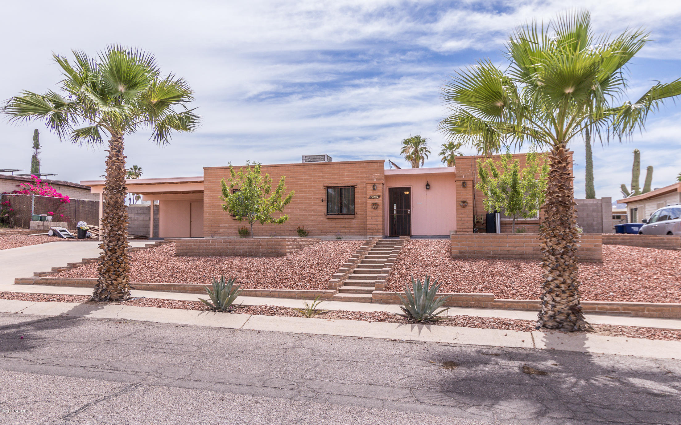 Price Reduction! Don't miss this Eastside stunner! This 3 bedroom, 2 bathroom home has a spacious 1,627 sq ft and sits on a large .18 acre lot. The roomy kitchen has loads of custom cabinetry with a lovely breakfast nook, full of natural light. The interior of the home features a combination of tile and laminate wood floors and all new interior doors, stained to match the kitchen cabinets plus a large brick fireplace in the huge family room. The backyard is a dream with plenty of room for a huge outdoor kitchen, built-in BBQ already set to grill! Cool off in the refreshing pool and enjoy being the entertainer of the year!