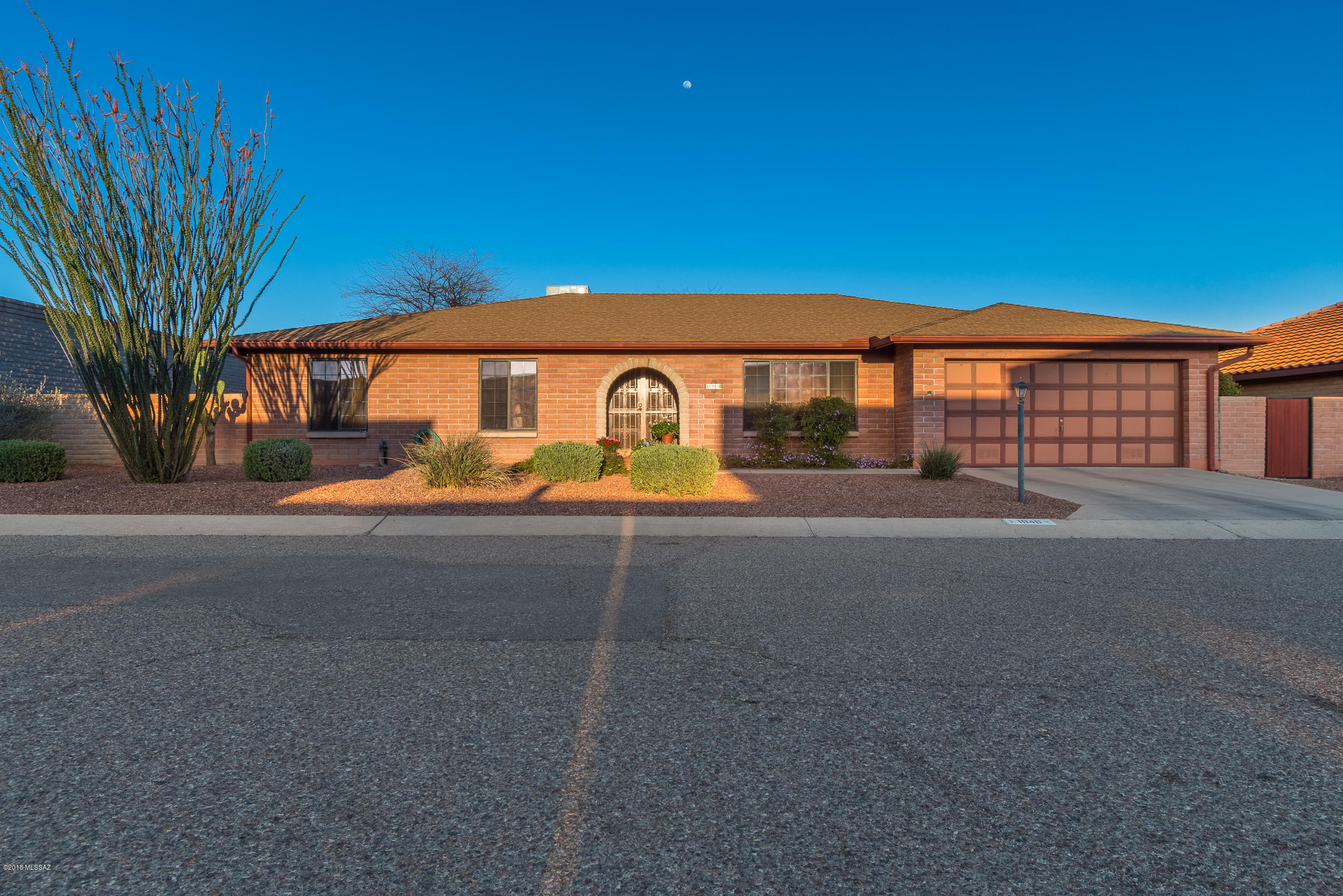 Beautiful ranch style 3-bedroom/2-bath home on .18 acres. Great features include a master suite with walk-in closet, separate shower. Formal dining room, casual living room with fireplace for ambiance, tile floors and carpet, open kitchen with pantry, garbage disposal, double sinks, dishwasher, breakfast area. Low care front and back yard, covered patio and fully fenced backyard. Office/utility room with built-in cabinets. Two car garage and NO HOA.