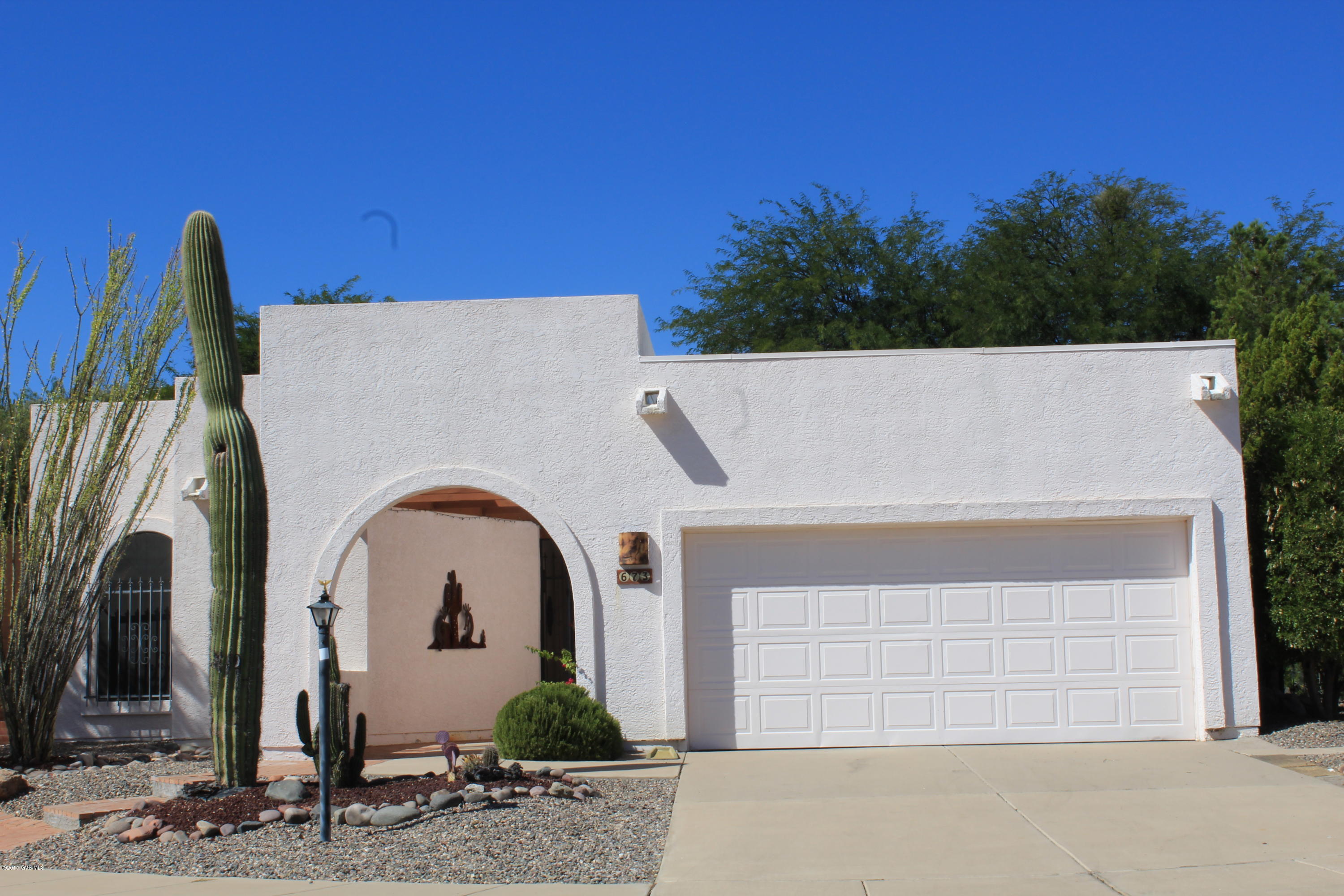 As you enter the home, you'll be greeted with light & bright surroundings w/lots of space. A solar tube in the living room offers extra light to the room. The kitchen has a stainless fridge & stove and some pull-outs. The cozy b'fast nook is right around the corner to enjoy your morning coffee. The AZ room gives you extra living space not included in the sq.ft. of the home. The 3rd bedroom could be used as a den/hobby rm & has a solar tube for extra lighting. The lg master bedroom easily accommodates a king bed with room to spare.The 2nd bedroom opens to a private patio for your guests. The Villages community has it's own pool, rec center & tennis. The 2-car garage has a separate storage room. Close to businesses, churches and activities, this neighborhood is a great place to call home.