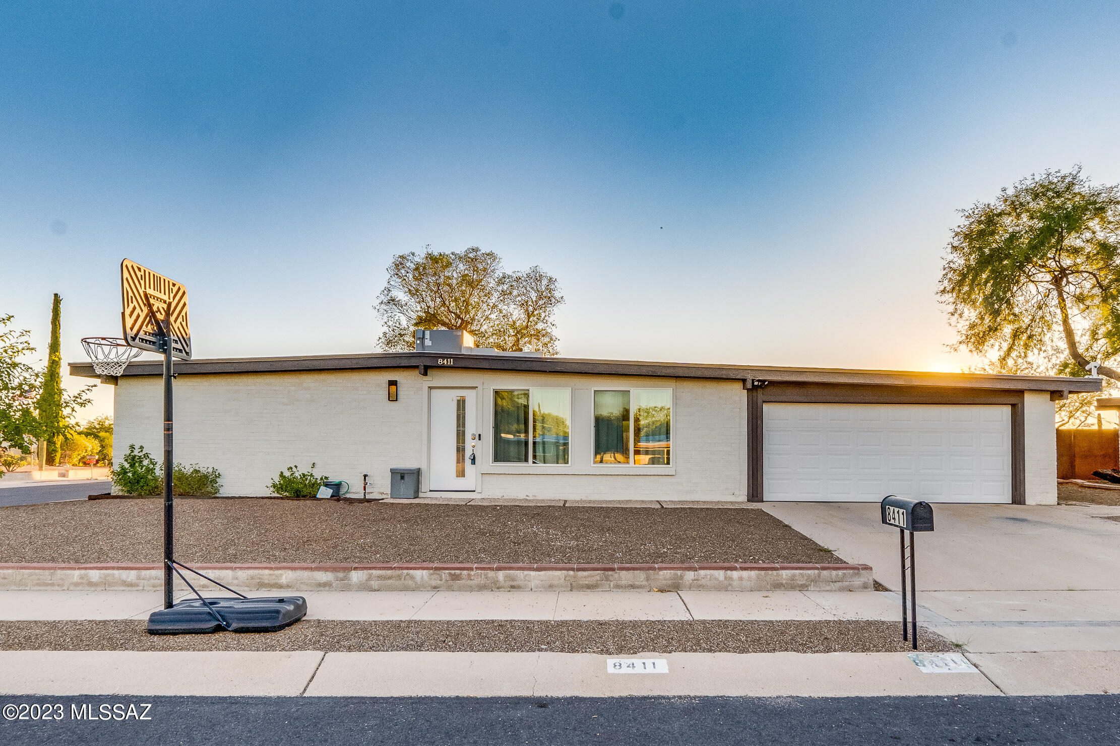 Eastside BEAUTY! Welcome home! Set on a corner lot, this property has all the curb appeal and space for you to entertain with an enchanting two-story playhouse! Walking in you are greeted with natural light, beautiful wood laminate flooring, and an open-concept floorplan. The den/living room warmly invites movie and game nights with the family and simple wind-down relaxation. The spacious gourmet kitchen is perfectly designed with plenty of cabinets, gorgeous quartz countertops, a deep pantry, and an island that will make hosting much easier! The primary bedroom gives the ultimate privacy with his and her closets and a spa-like bathroom perfect for those long days! The additional four bedrooms are perfectly laid out for the little ones, out-of-town visitors, or hobbies. When you thought it couldn't get any better, the backyard is a true entertainer's dream! The corner lot provides substantial space for all your special occasions and family pets! The deep-covered patio is a nice retreat as you watch the kids make memories in the two-story playhouse. This property has so much to offer, and we mean it when we say you won't want to miss this rare opportunity!