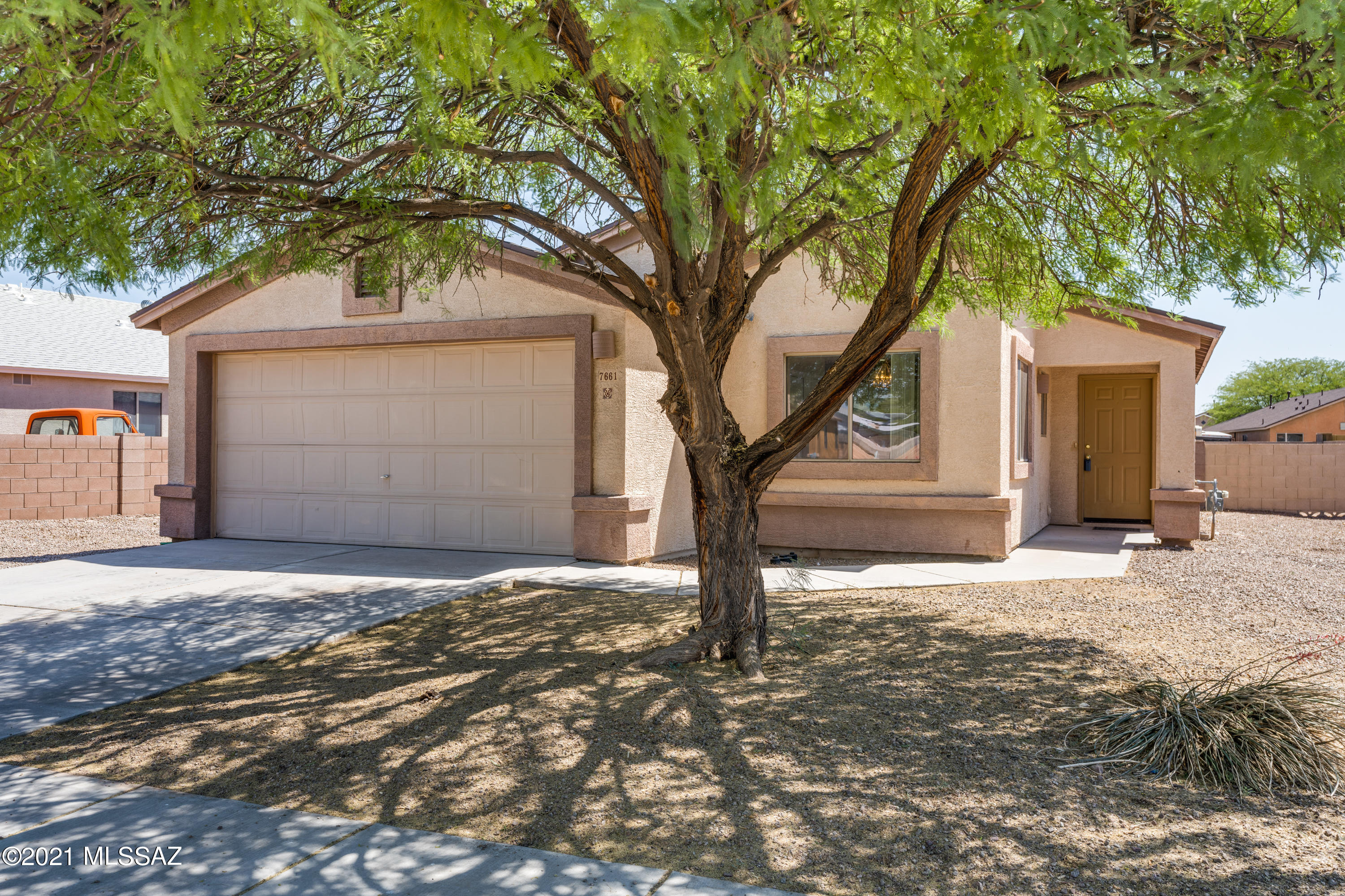 Move-in Ready Single Story 3 Bdrm/2 Full Baths, 2 Car Garage Home on Large Enclosed Lot!  Newer Roof (2018), New Wood Flooring (2021) In Kitchen, Dining Area, Hallways, Bathrooms & Laundry Room.  Refrigerator Included. Freshly Painted Inside, Including Cabinets.  Bright and Airy Great Room with High Ceilings and Sliders to Covered Patio That Open To The Spacious Backyard With Block Wall And Wide Side Gate.  Nice Shade Tree Out Front.  Quiet Cul-De-Sac Street.  Close to Dining, Desert Diamond Casino, Spectrum Shopping Center, School, Park, Etc. Range Priced 210-220K.
