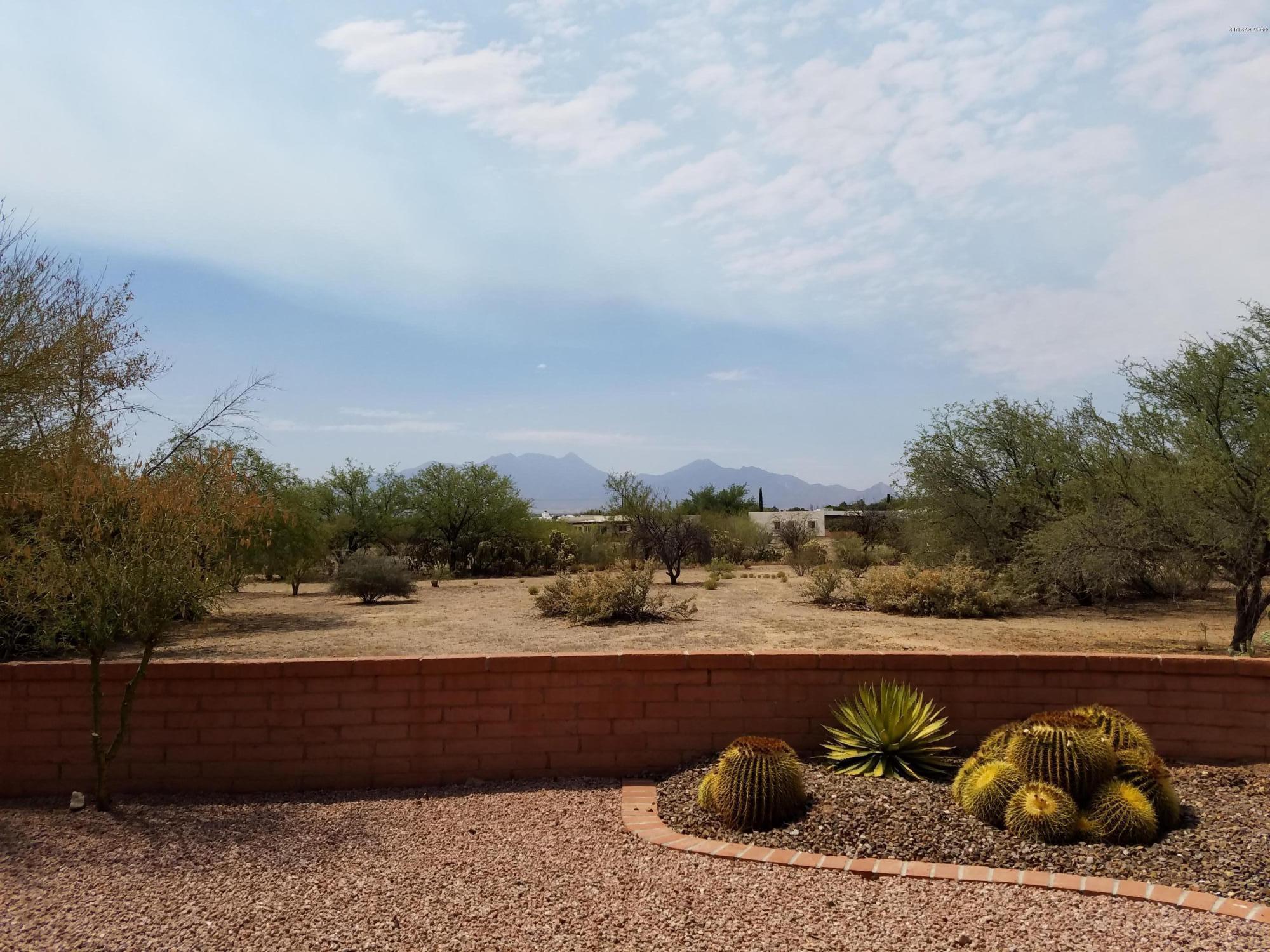 GREAT MTN. VIEWS WITH LOTS OF COMMON AREA SURROUNDING THE HOUSE.
 LOVELY COVERED PATIO WITH FANS GREAT PLACE TO ENJOY SCENERY AND WILDLIFE.
 HOME HAS BEEN NICELY UPDATED.
 SPACIOUS MASTER AND GUEST BEDROOM; FAMILY ROOM; LAUNDRY ROOM HAS EXTRA STORAGE. FURNITURE AVAILABLE BY SBOS.