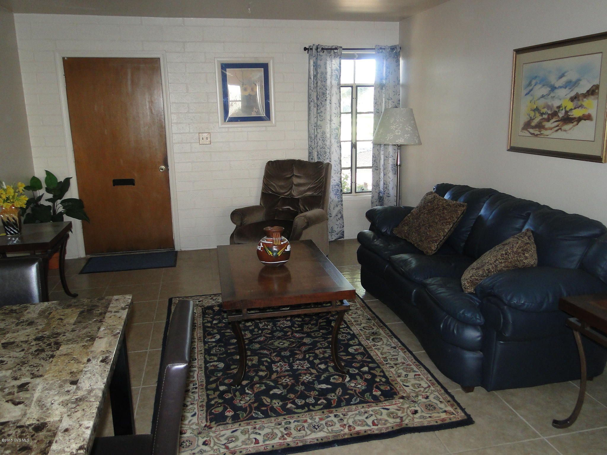 Great location! Patio has nice shade tree while you sit and relax overlooking the grassy circle. Nice furnishings included. Tile floors through out. New Refrigerator. Close to parking. Central location, nearby amenities. HOA cover all exterior, including Roof, Water Heater, Heating & Air. Termite treatment and trash pickup. Great for full or part time residents.