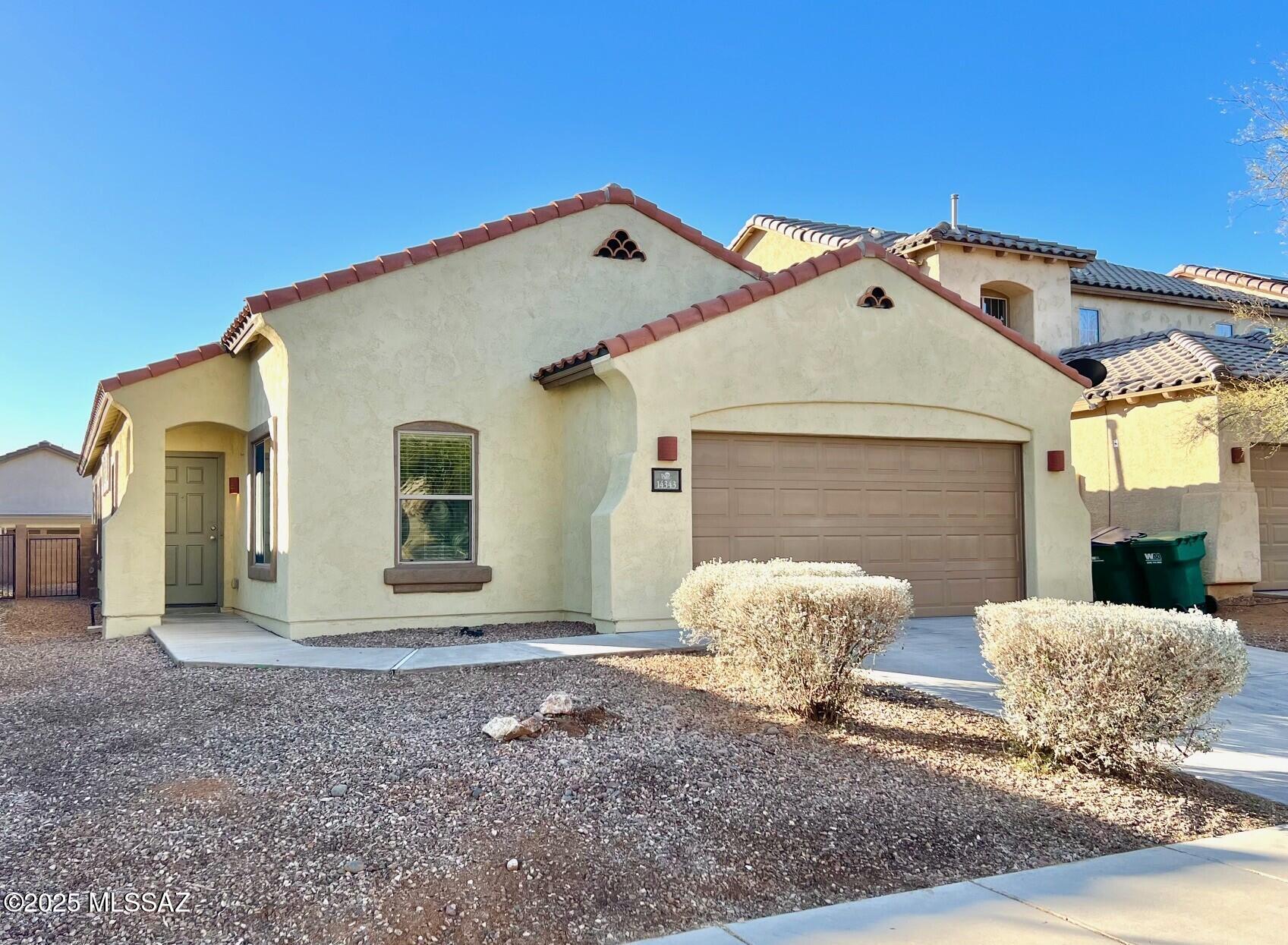 Wonderful Pulte built single story home in the beautiful Rancho Sahuarita community featuring: a gorgeous kitchen with lots of counter space, kitchen island, stainless appliances, and a breakfast nook, large open great room with lots of natural light, new wood laminate flooring, and raised ceilings, upgraded tile in kitchen, baths and entry way, ceiling fans, fresh interior and exterior paint., upgraded light fixtures, new carpet in all bedrooms, large master bedroom with fabulous walk-in closet and a master bath with double vanities and a walk-in shower. Enjoy the walled in backyard from the covered patio. Lots of Rancho Sahuarita amenities with swimming, fitness, lake activities. Owner is licensed Agent in AZ.