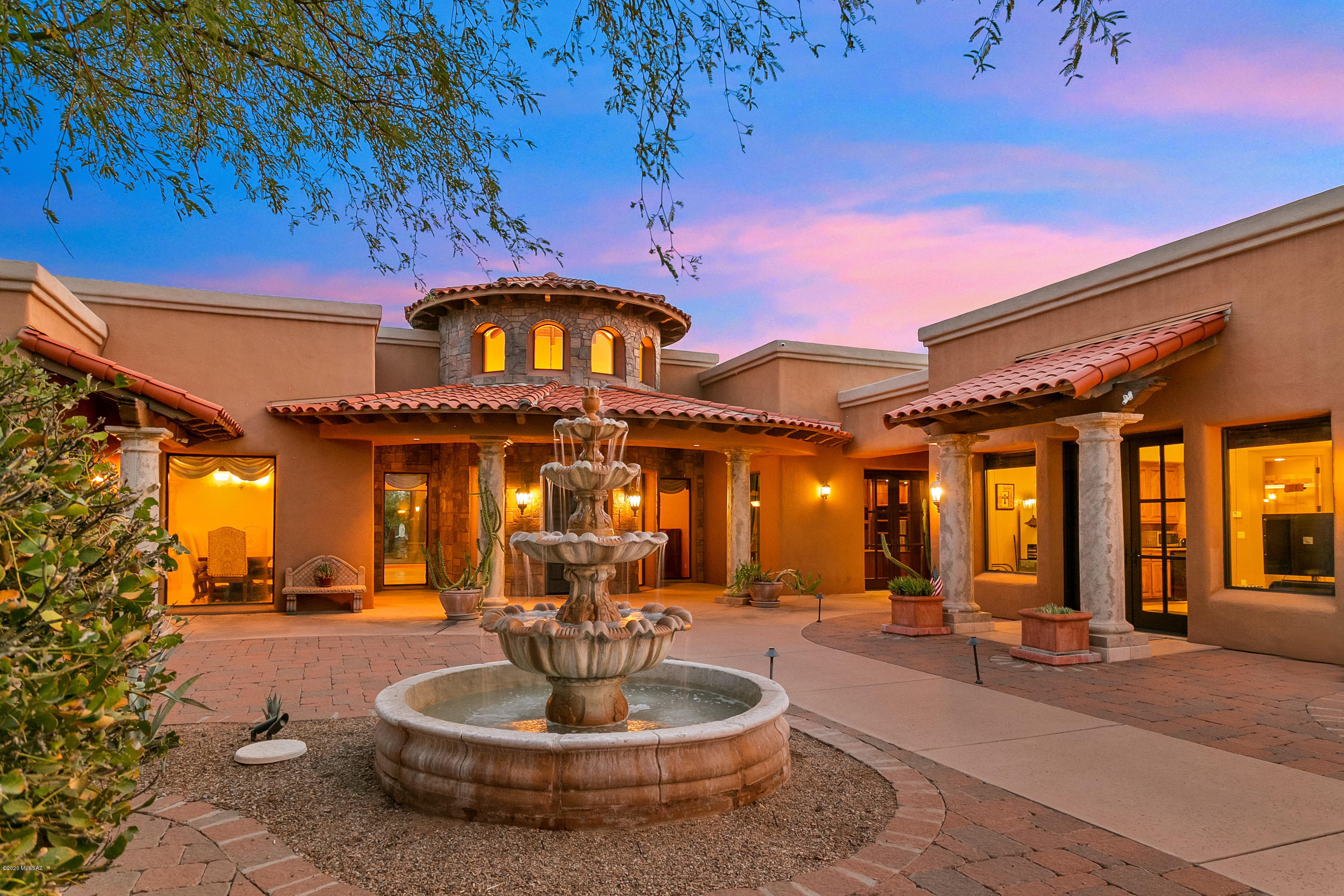 There's a stunning private residence in Telesis Estates waiting for discerning buyers. It rises on 3.3 acres in Tucson's Tanque Verde Valley - complimenting unbelievable views. Once inside the gated courtyard entry, this Mediterranean masterpiece unfolds into a spectacular home. Travertine flooring enhances the grand spaces. There are 8' doors and a gracious main bedroom suite with fireplace, sauna, and huge walk in closet. The gourmet kitchen is a dream for creating sumptuous meals with family and friends. Everything is there – granite countertops and a spacious pantry to Viking appliances. There's a 4 car garage with abundant storage. Since only the best will do, the property is professionally landscaped and includes a sparkling pool, putting green, and cabana with built-in appliances. The property feels peaceful and secluded while its location is convenient to town. This one definitely ticks all the boxes. Come see for yourself.