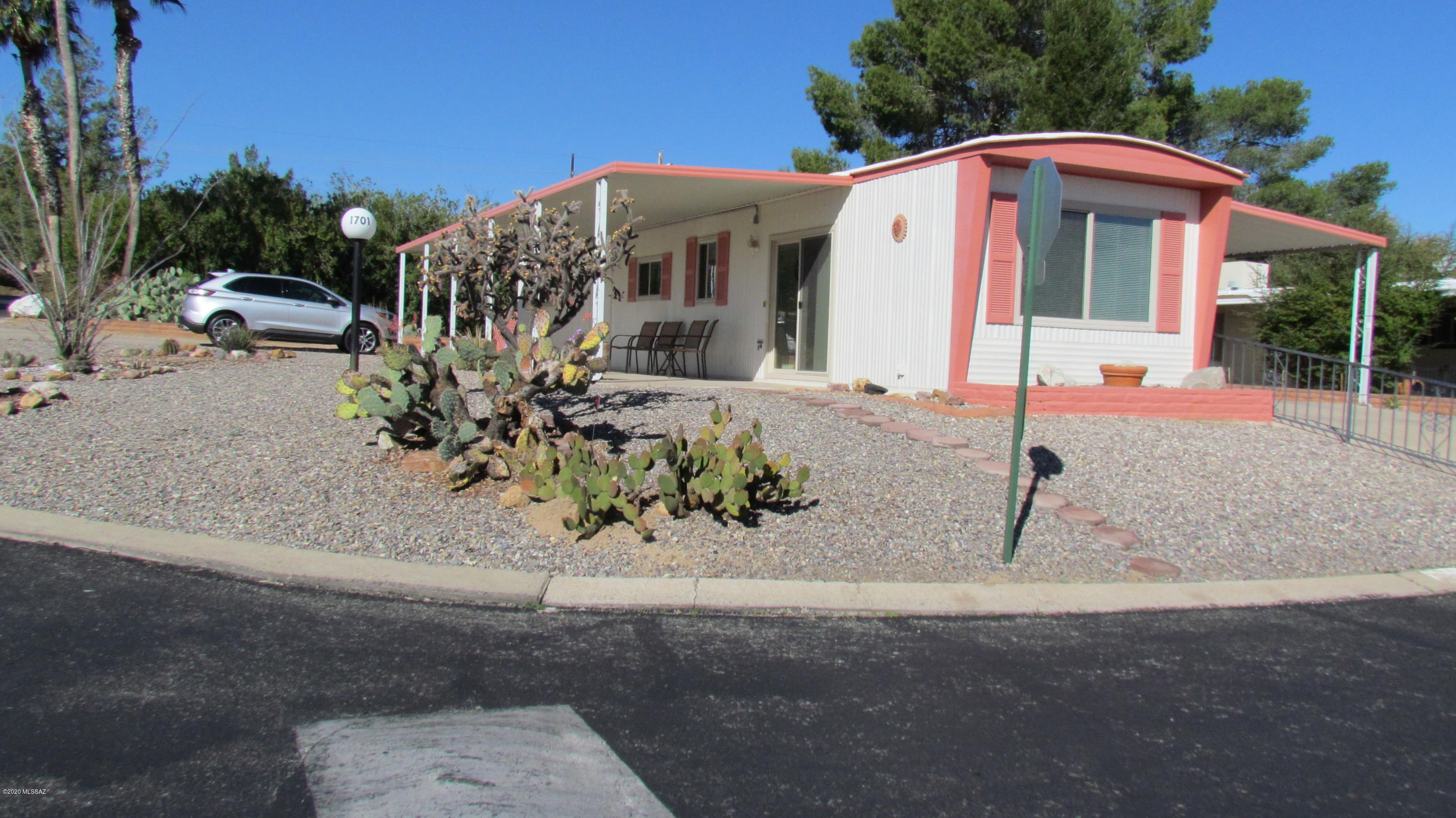 Lovely, well maintained home. Furnished and ready to move in. Large corner lot with great mountain views. Windows and sliding doors new in 2019. Updated bath with large walk-in shower Termite Warranty with Bill's Home Service until 11/2020.