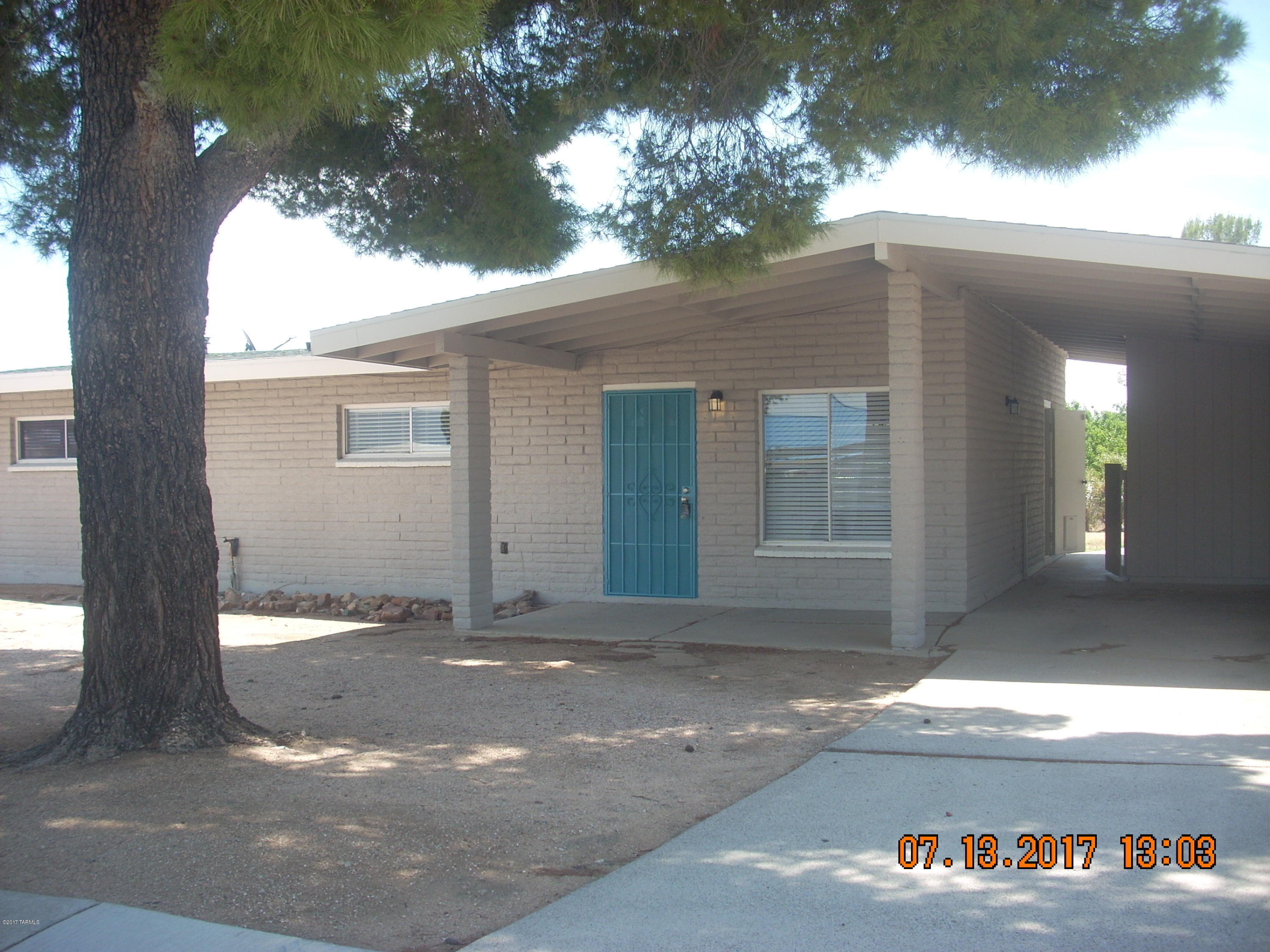 This home has been remodeled through out. Remodeled kitchen and baths, new flooring, window coverings, new paint, all new appliances, fenced back yard, extra carport and bedroom or den. So many upgrades.  This one is a must see!