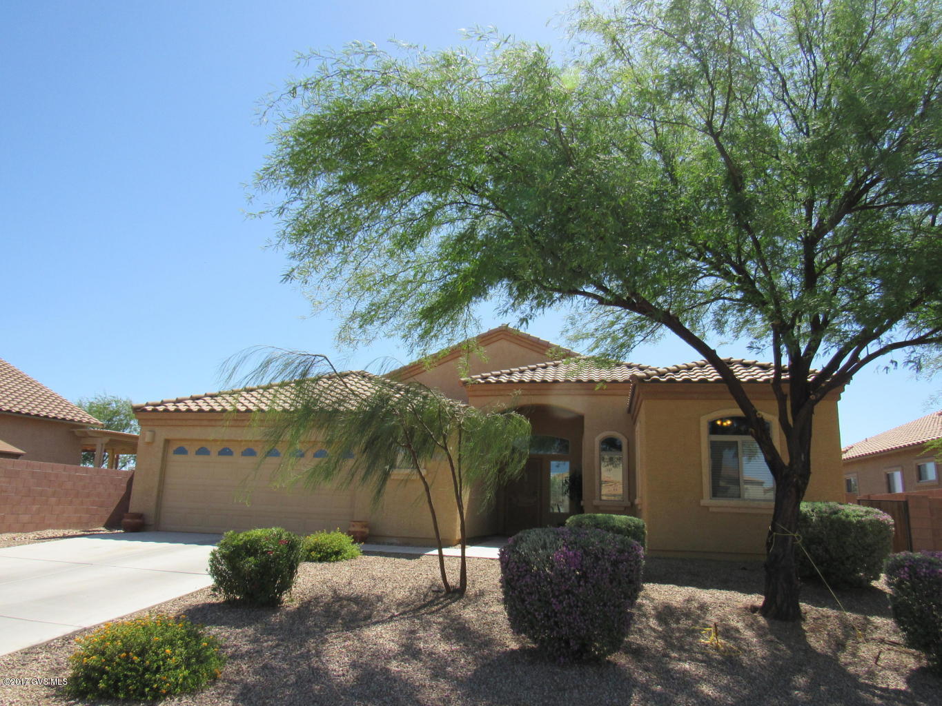 Looking for a huge yard, with no rear neighbors? How about an outdoor kitchen area and fire pit? This beautiful home has granite counters, a large island with a breakfast bar, and upgraded cabinets in the kitchen. It also offers tall ceilings, an open floor plan, a 2.5 car garage, mountain views, and is close to the community park and pool. Come take a look and fall in love with this house!