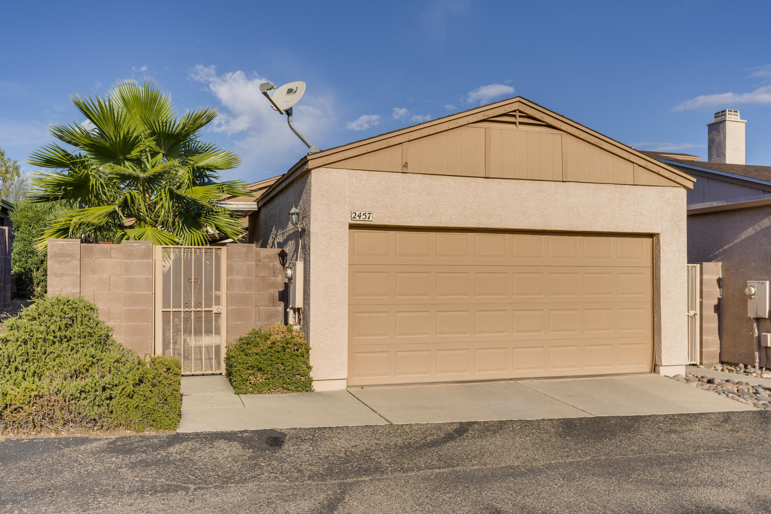 You will love this charming 2 bedroom, 2 full bath, detached townhome in the gated community of Casitas De Palo Santo. Bright & spacious floorplan. Generous sized bedrooms. Eat-in kitchen, dining area & great room. Updated bathrooms. Newer fixtures. Low maintenance, stained concrete flooring. New storage shed in backyard.  Great location, 4.4 miles from U of A & 4 miles from PimaCommunityCollege. Property backs up to green space, w/ no neighbors directly behind. New energy efficient, dual pane, vinyl windows & sliding glass door. Enclosed garage w/ custom cabinets. Mature grapefruit tree in back. Enjoy your morning coffee in your private backyard patio or front courtyard. Great primary residence, investment or second home. Open House 11/7 11am-4pm. Owner Agent