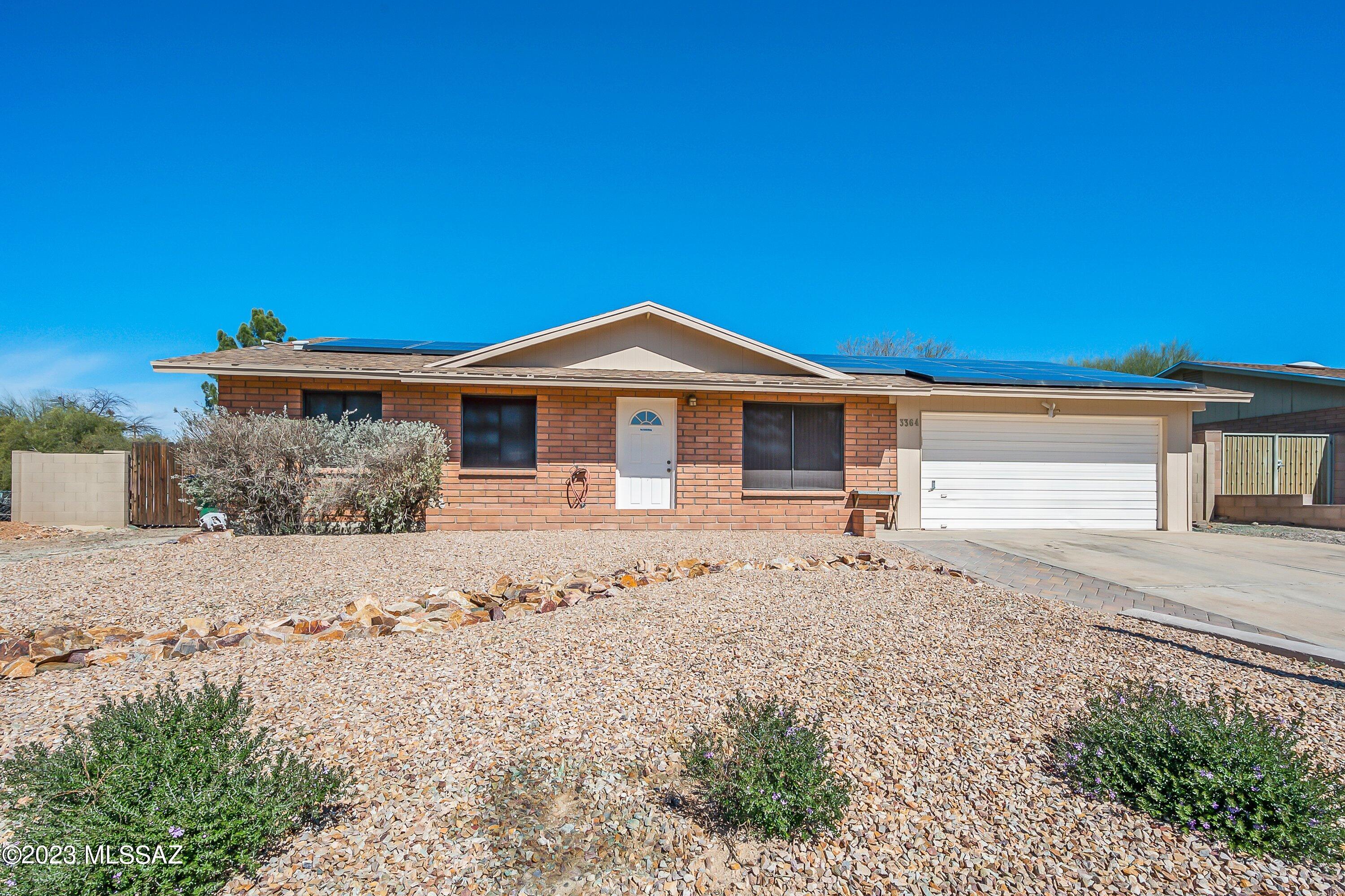 Ready to work on your golf game? Check out the great putting green in the oversized backyard! This super cute 3 bedroom / 2 bathroom house is conveniently located near everything! There is room for a pool, RV parking, No HOA, covered patio & dog run. Your opportunity has arrived! Check it out before it's GONE!  **Seller needs COE after May 25th**  Portable island and cabinet in kitchen do not convey.