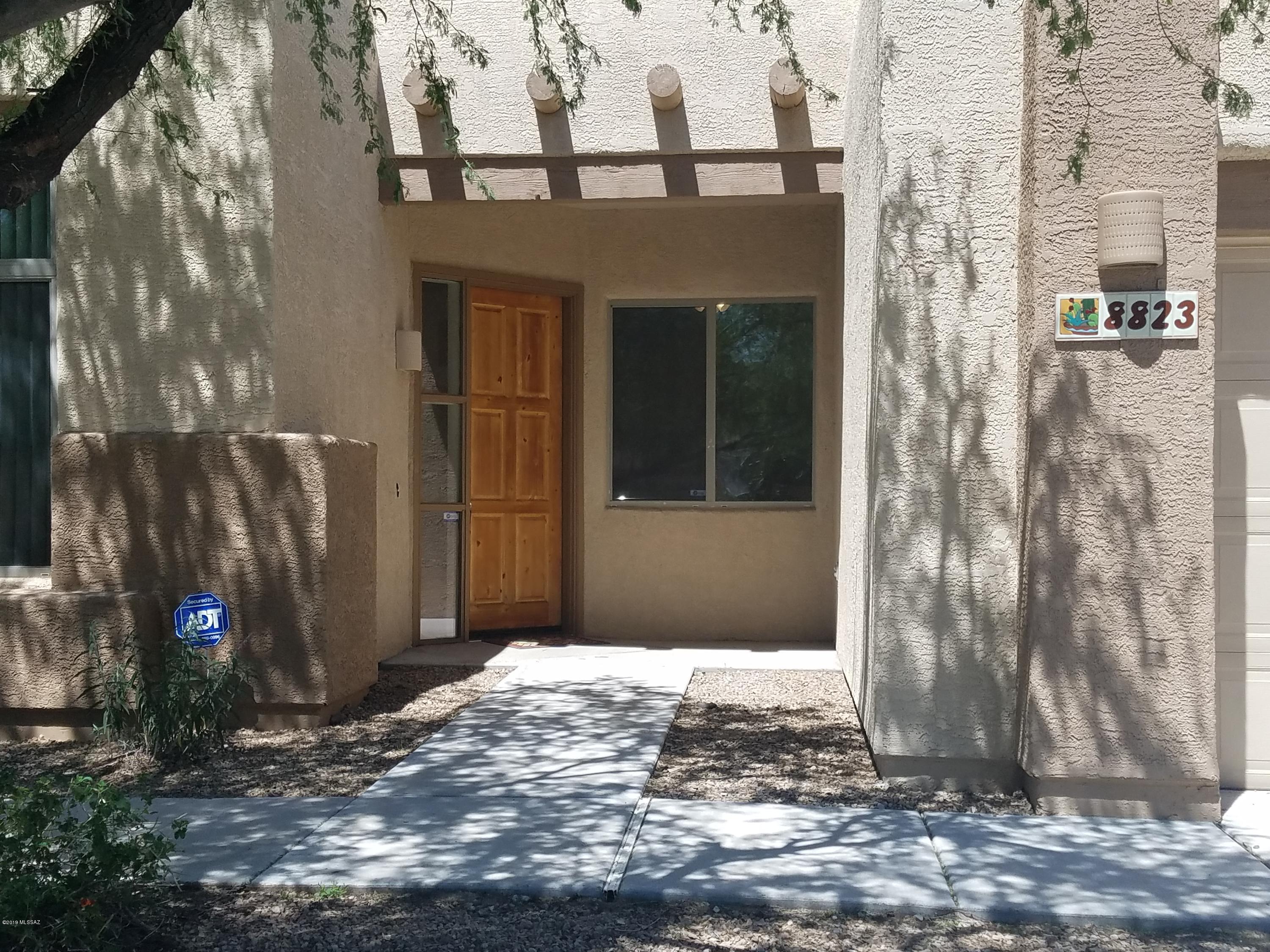 Very nice Southwestern home nestled in a small, quiet community of 32 homes in NW Tucson!  Enjoy the greatroom affect, with an open floorplan and lots of windows offering natural lighting.  Enjoy the spacious kitchen, plenty of counter & cabinet space and a large pantry closet!  Eat-in area & den are directly off the kitchen.  Backyard is completely landscaped and perfect for your outdoor entertainment.  There's even a mature lemon tree on the side yard AND the properties are space nicely from the neighboring houses!  This lovely home is move-in ready and just waiting for you so don't wait, see it today!
