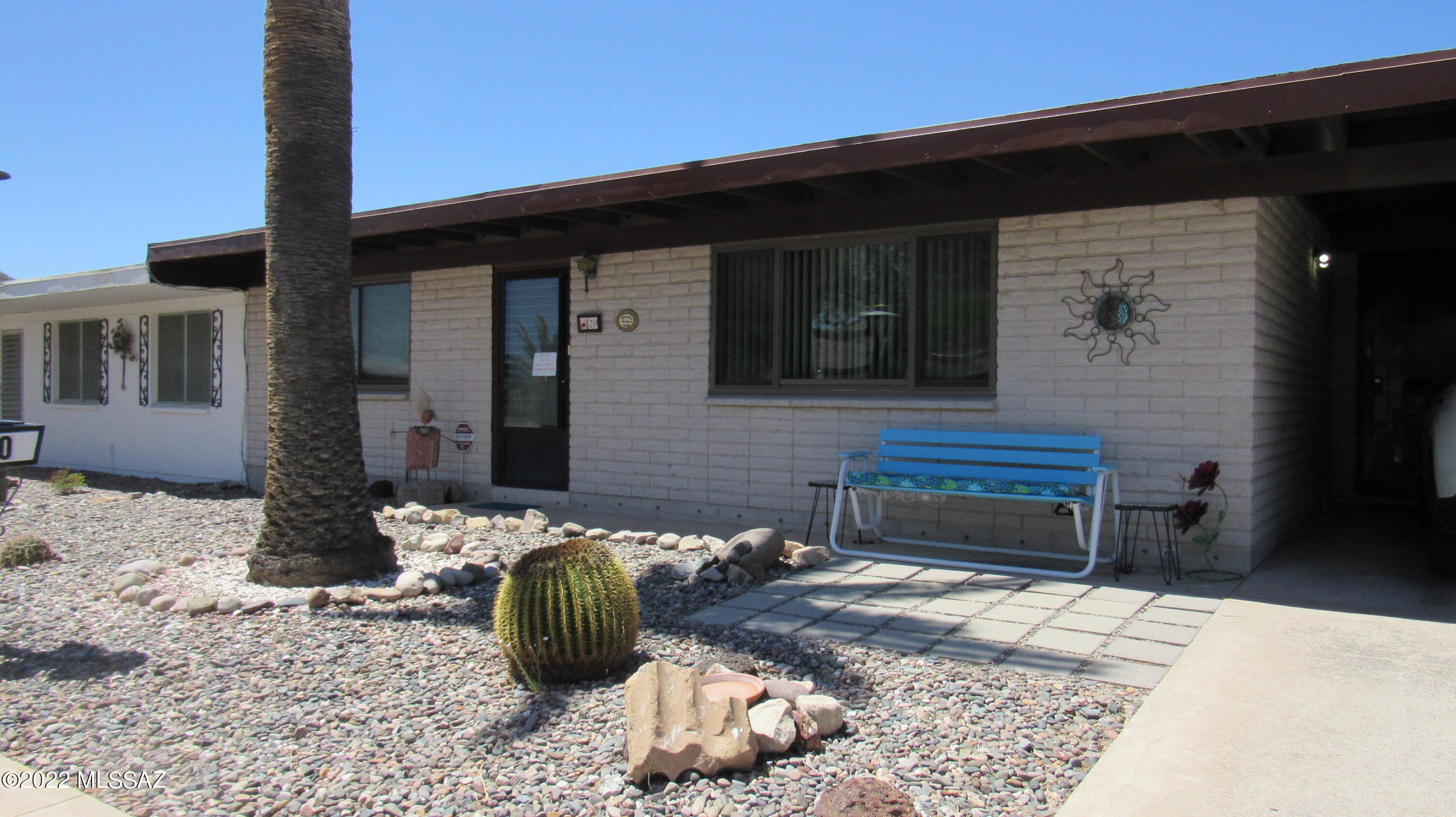 Well-maintained 2 bedroom, 2 bathroom townhome in this west side 55+ community. Some updates throughout this functional floor plan include open-concept kitchen and dining area, double-paned windows, stainless steel appliances, dual cooling and enclosed sunroom with sliding glass door to paved back patio. Clubhouse/recreational center with pool, fitness equipment, library, pool and table tennis tables and kitchen right across the street. Minutes to shopping, medical facilities, amenities and freeway. Owner-occupants only, and no pets except one indoor cat. Youngest occupant must be 45 or older. HOA fees covers pool, clubhouse, water, sewage, trash and street maintenance. Disclosure meeting with HOA Board of Directors required prior to Closing.