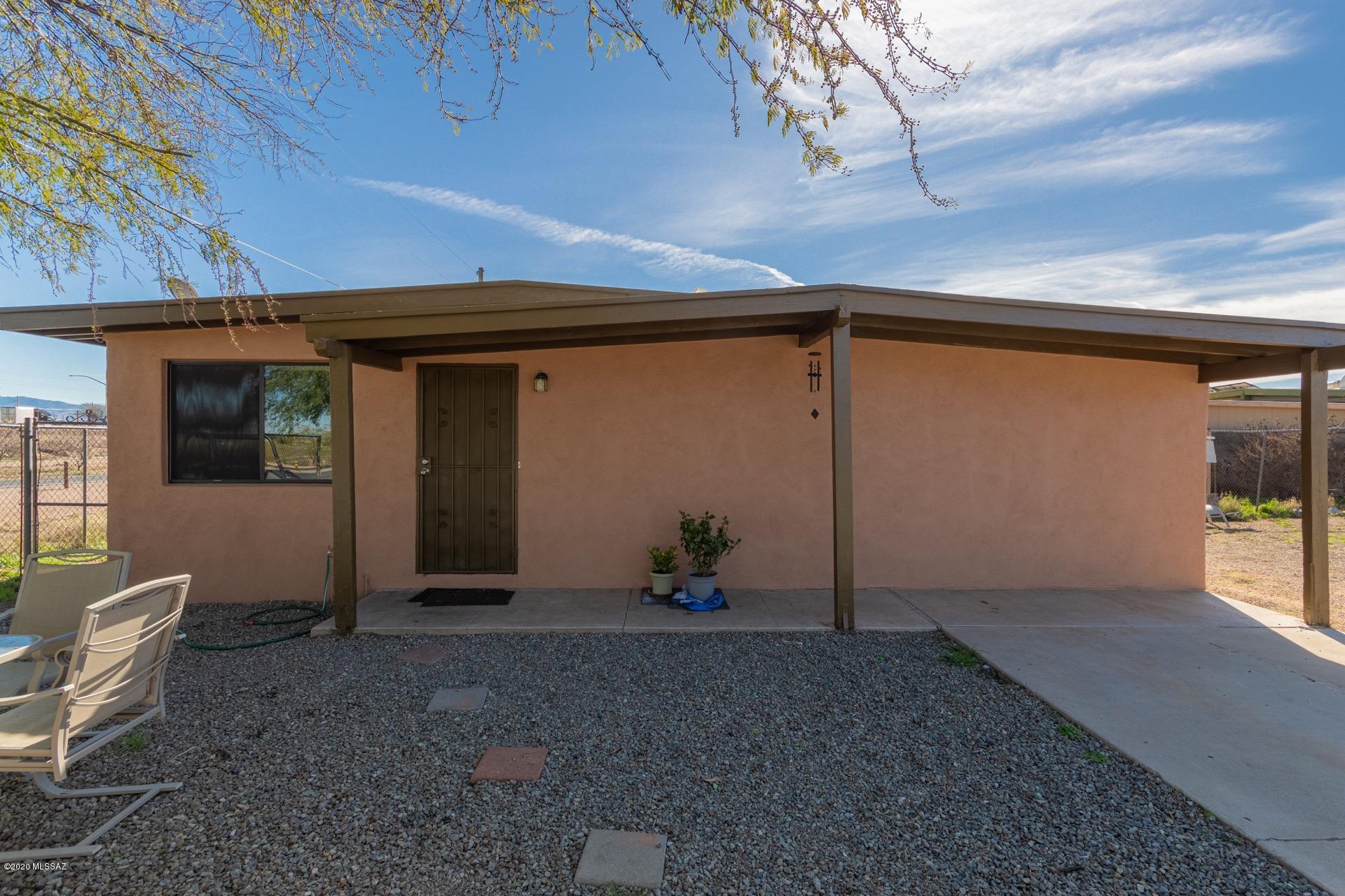 Very charming 4 bed/2 bath south Tucson home available at the end of a quiet street just steps from Los Ninos park and elementary school. Nestled just off of the I-10, home is with easy reach of shopping, restaurants and downtown Tucson. Inside is bright and inviting with warm paint tones and low maintenance tile flooring throughout. Kitchen is complete with plenty of cabinet and counter space and overlooks the dining room with a cut out. Bedrooms are generously sized with plenty of space for sleep, study and storage. Master retreat includes a 3/4 en-suite. Lots of outdoor space. The huge backyard offers a storage shed, gorgeous mountain views and is ready for your personal touch. This gem is available at an excellent value and will sell fast. Call to schedule your showing today.